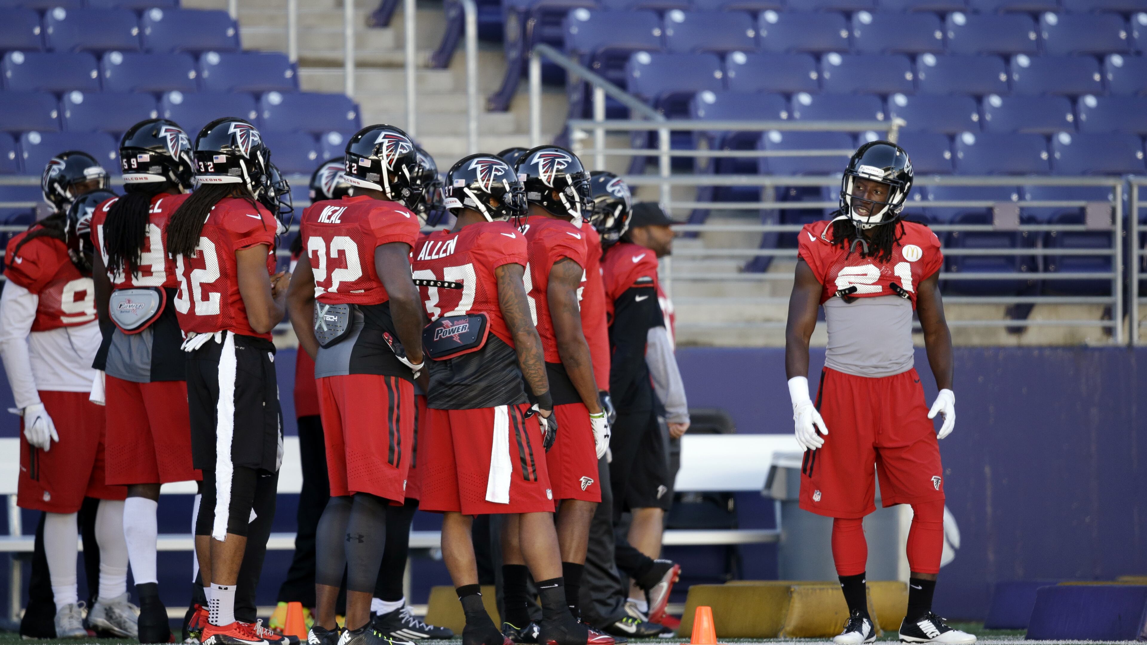 Atlanta Falcons’ Desmond Trufant, right, stands with teammates during a practice at the University of Washington Wednesday, Oct. 12, 2016, in Seattle. Trufant played college football at the school. Rather than head home, the team traveled directly to Seattle after their football game Sunday in Denver, ahead of playing the Seattle Seahawks this coming Sunday, Oct. 16, in Seattle. (AP Photo/Elaine Thompson)