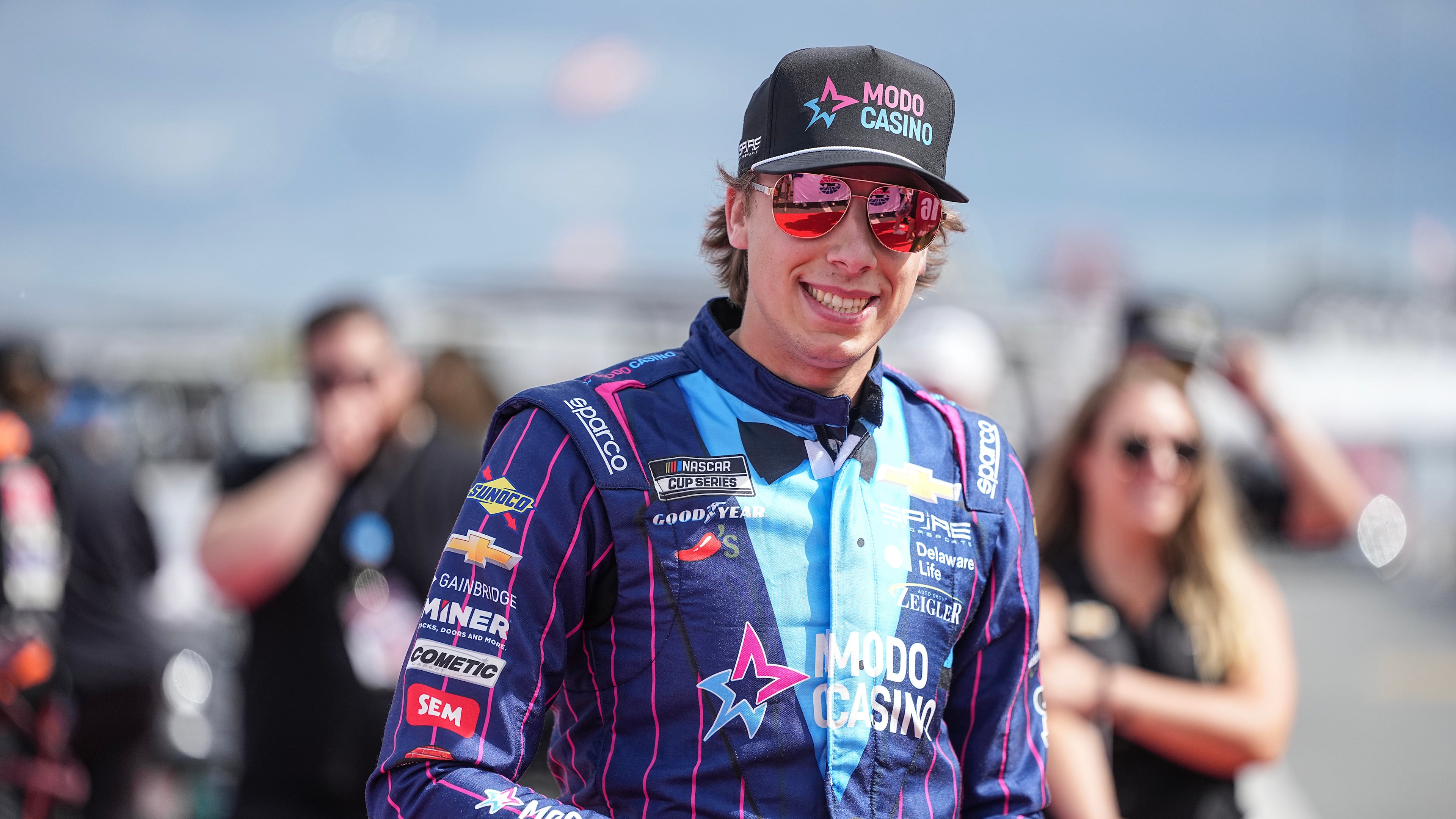 FILE - Carson Hocevar smiles prior to a NASCAR Cup Series auto race at Charlotte Motor Speedway, Oct. 5, 2025, in Concord, N.C. (AP Photo/Matt Kelley, File)