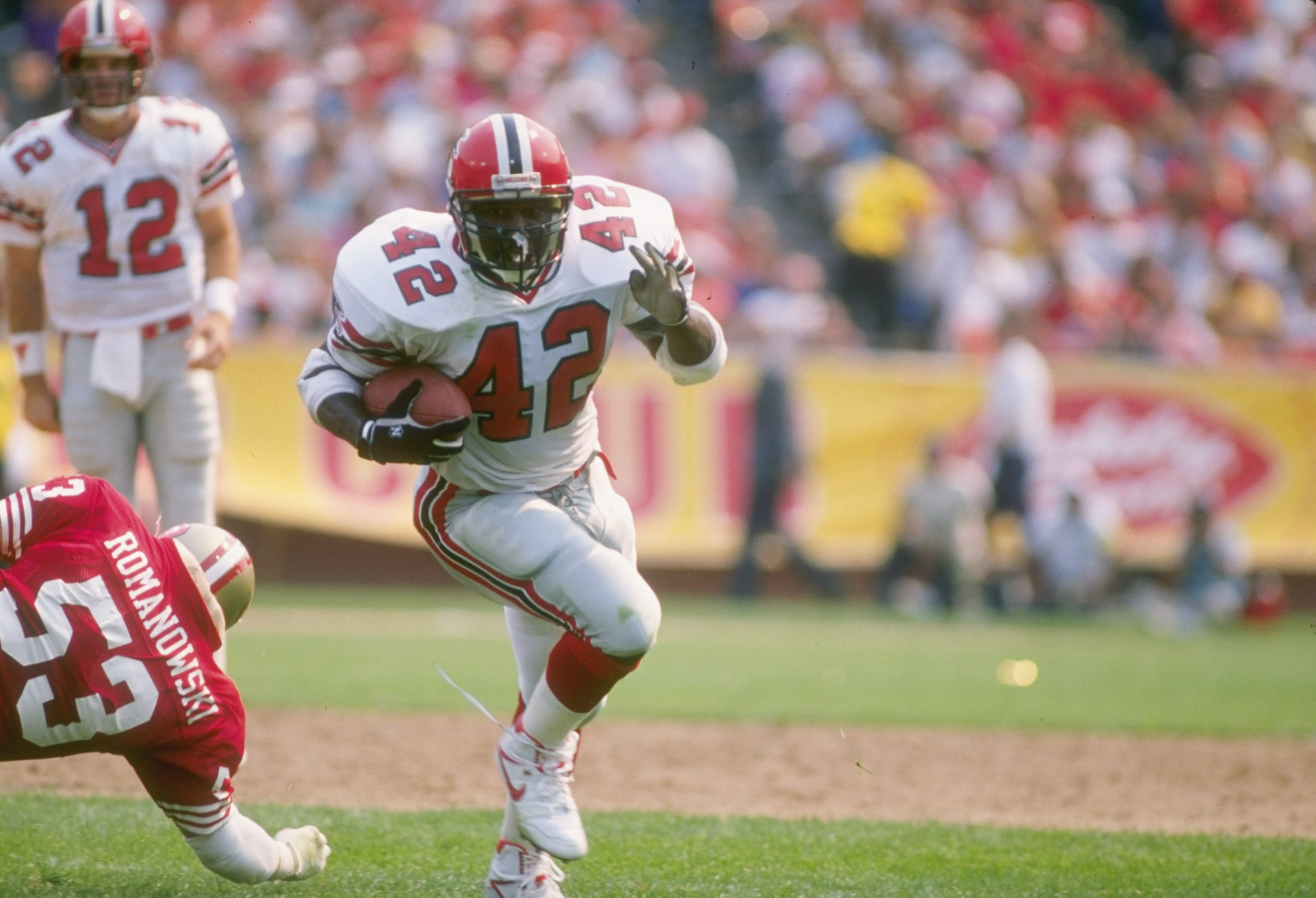 Gerald Riggs of the Falcons has some room against the San Francisco 49ers. (Photo by Getty Images)