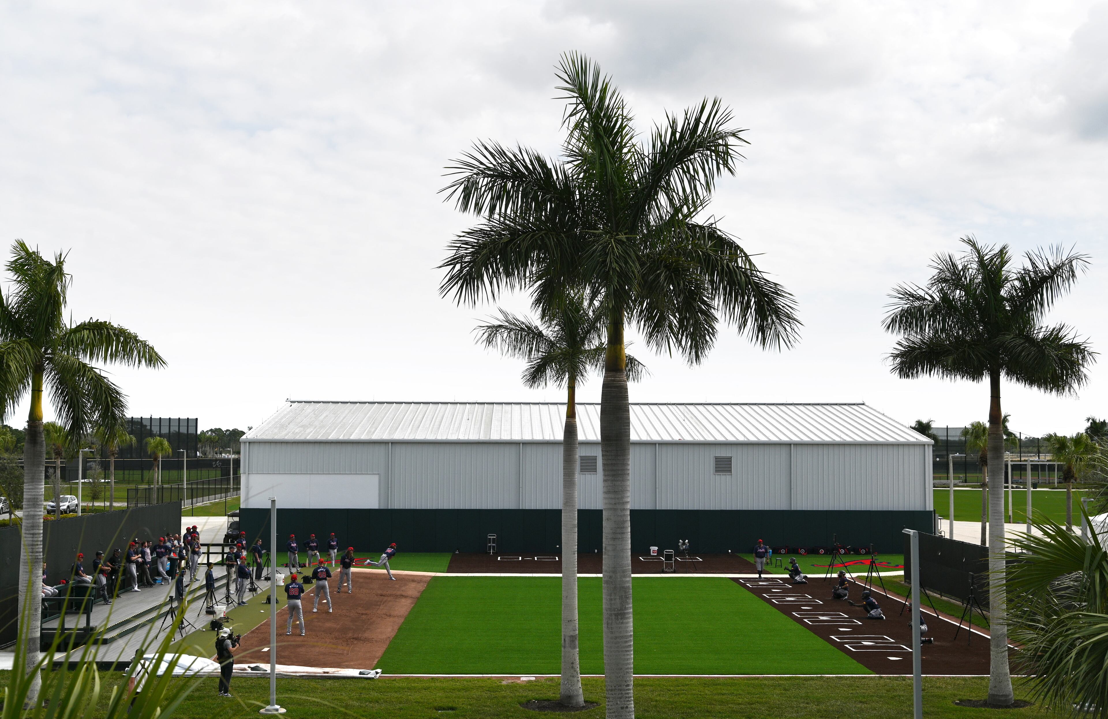 Atlanta Braves pitchers throw in the bullpen during spring training workouts at CoolToday Park, Friday, February, 16, 2024, in North Port, Florida. (Hyosub Shin / Hyosub.Shin@ajc.com)