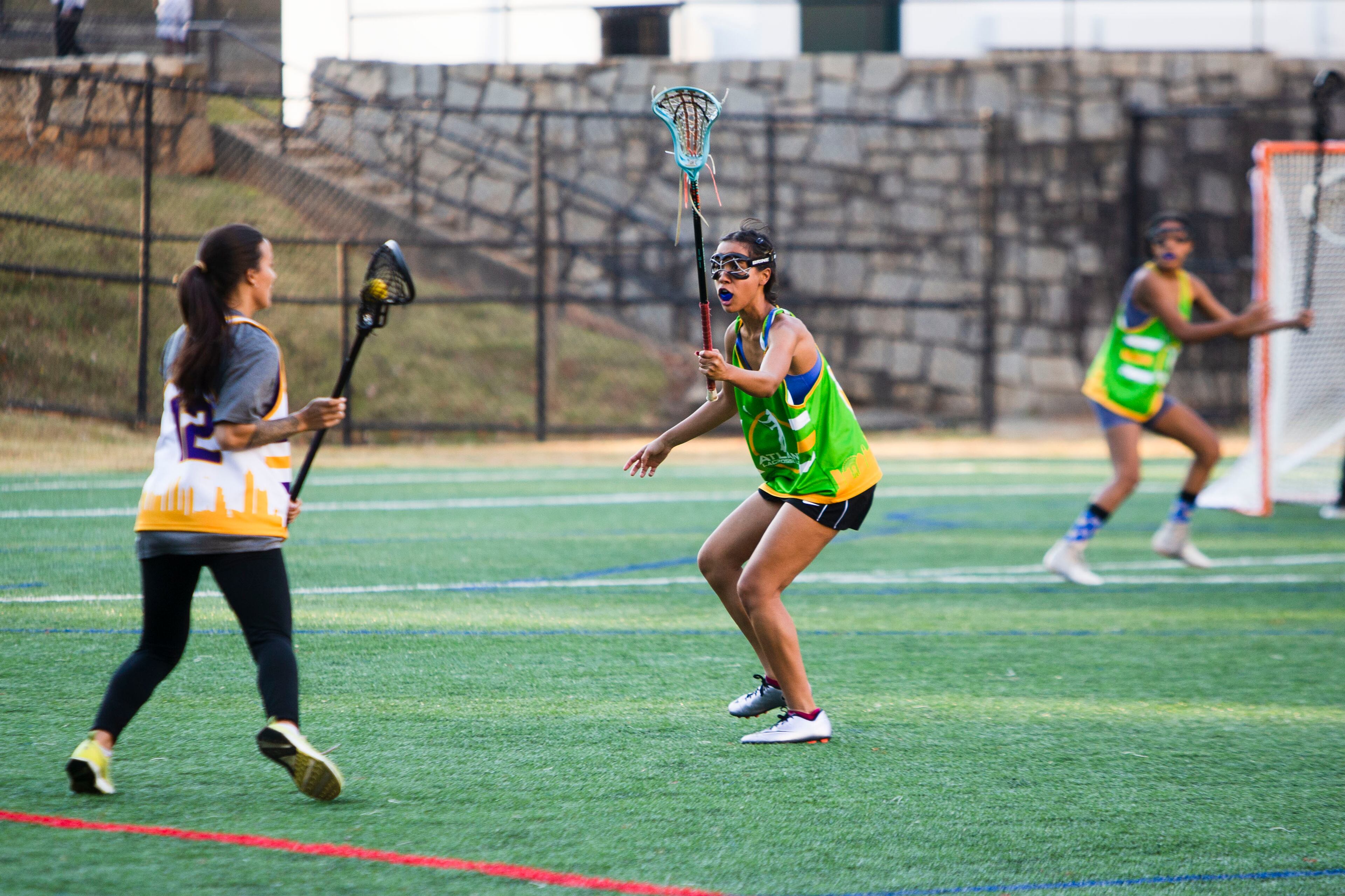 Pauline Caldwell (middle) plays defense during the Spelman College lacrosse game on Sunday, October 23, 2022, at Hammond Park in Sandy Springs, Georgia. Several girls on the Spelman team said that joining the lacrosse team was the first time they felt a part of something on campus. CHRISTINA MATACOTTA FOR THE ATLANTA JOURNAL-CONSTITUTION.