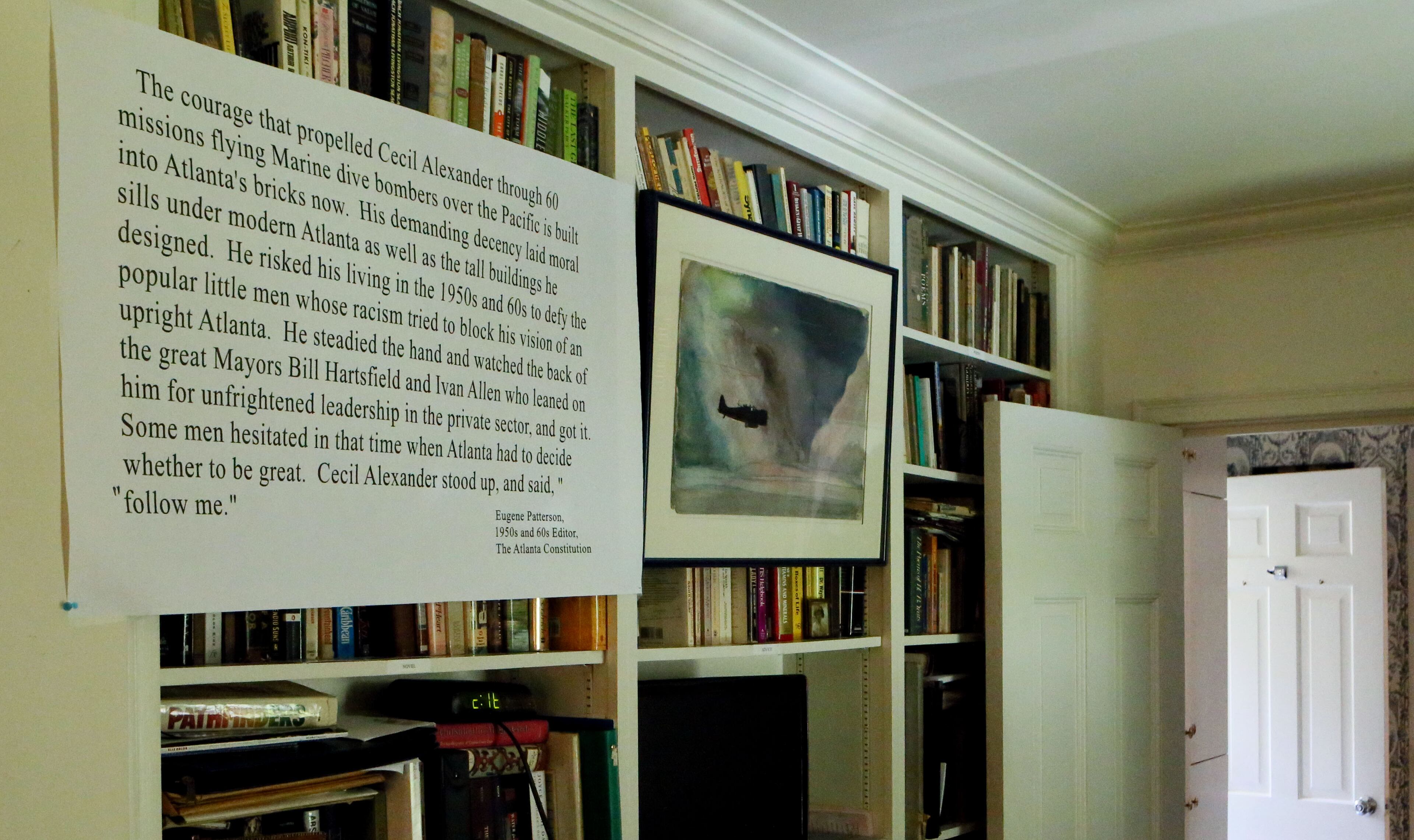 A quote by Eugene Patterson sits in the bedroom of Alexander's, 95, Buckhead home. PHIL SKINNER / PSKINNER@AJC.COM