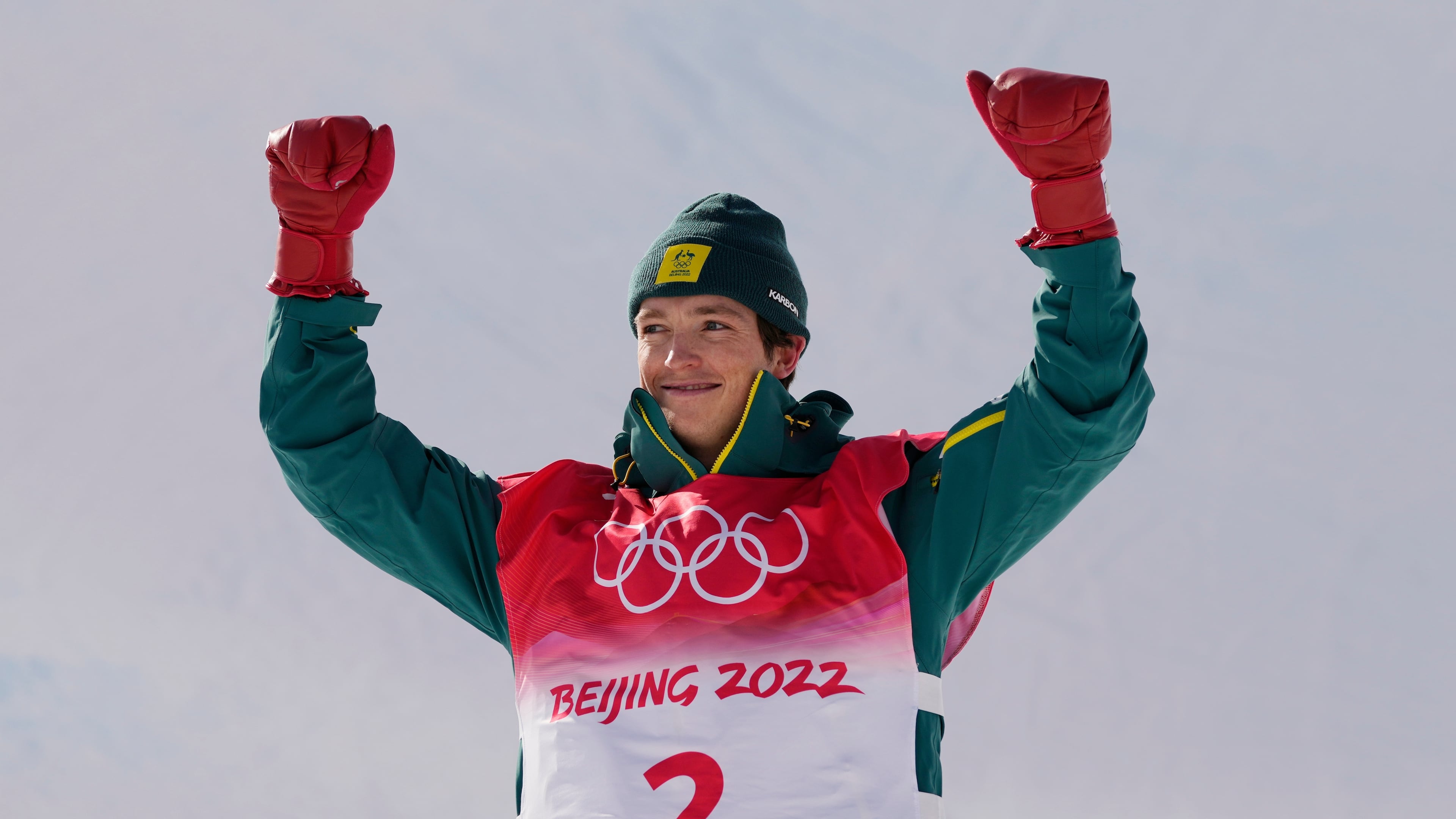 FILE - Silver medal winner Australia's Scotty James celebrates during the venue award ceremony for the men's halfpipe finals at the 2022 Winter Olympics, Feb. 11, 2022, in Zhangjiakou, China. (AP Photo/Francisco Seco, File)