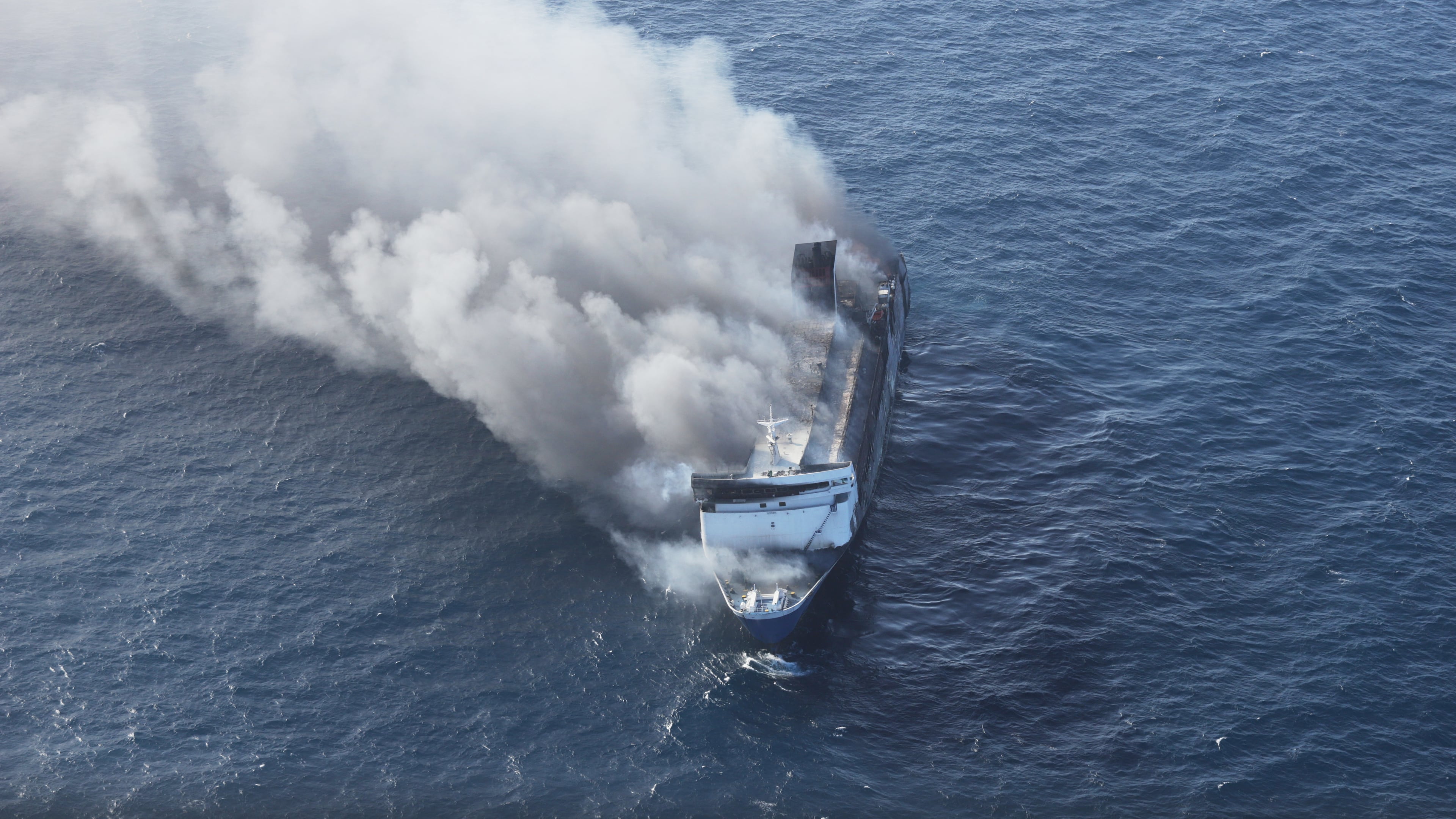 Smoke billows from passenger ship Mutiara Santosa 2 after it caught fire in the waters off Madura Island, Indonesia, Sunday, Aug. 2, 2026. (AP Photo)