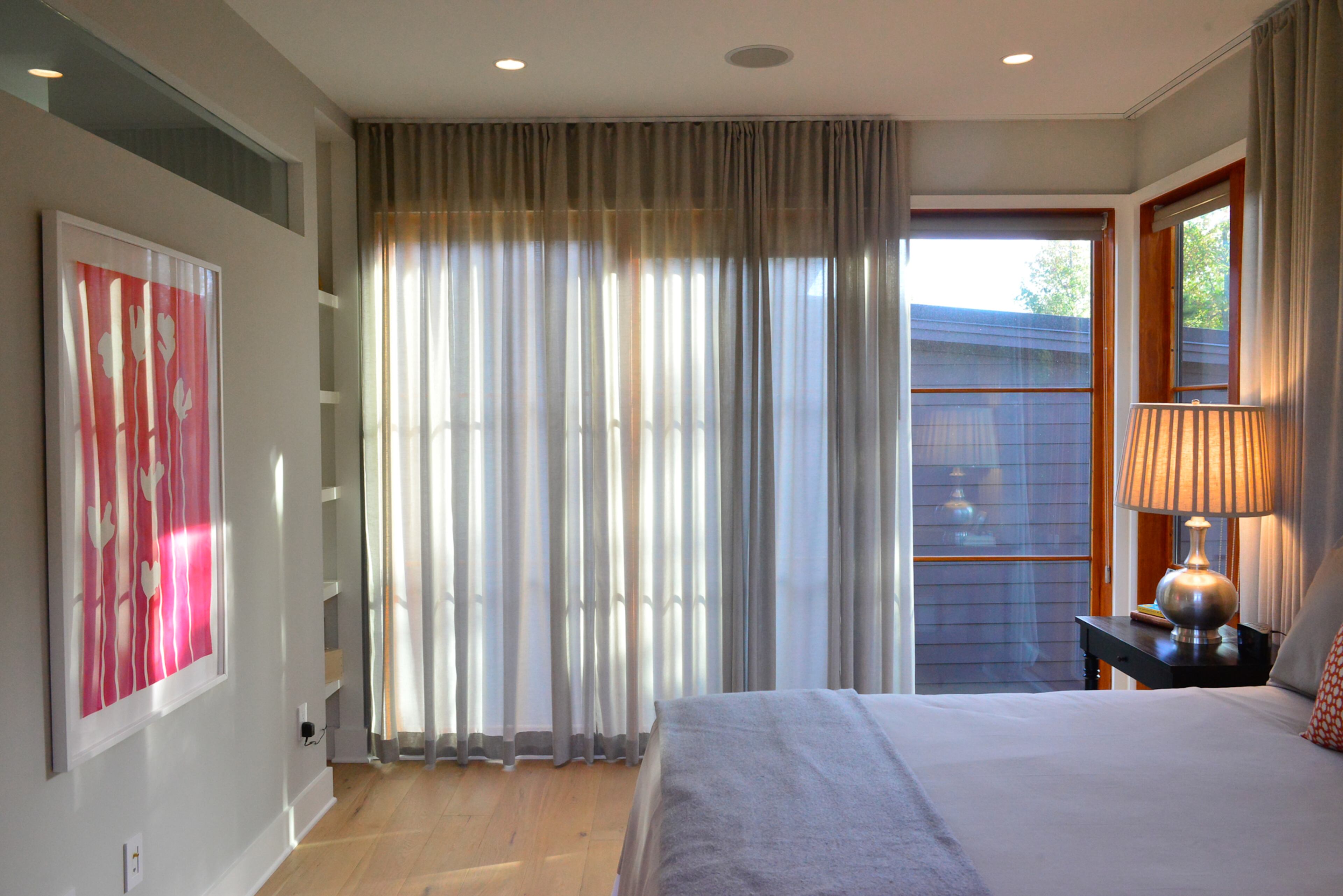 The master bedroom is simple, clean and functional. "I use this as an opportunity to only think about simplified living vis-a-vis Serenbe but I tried to incorporate that into my own home, to keep it functional and livable in that way," said homeowner Heath Daughtrey.