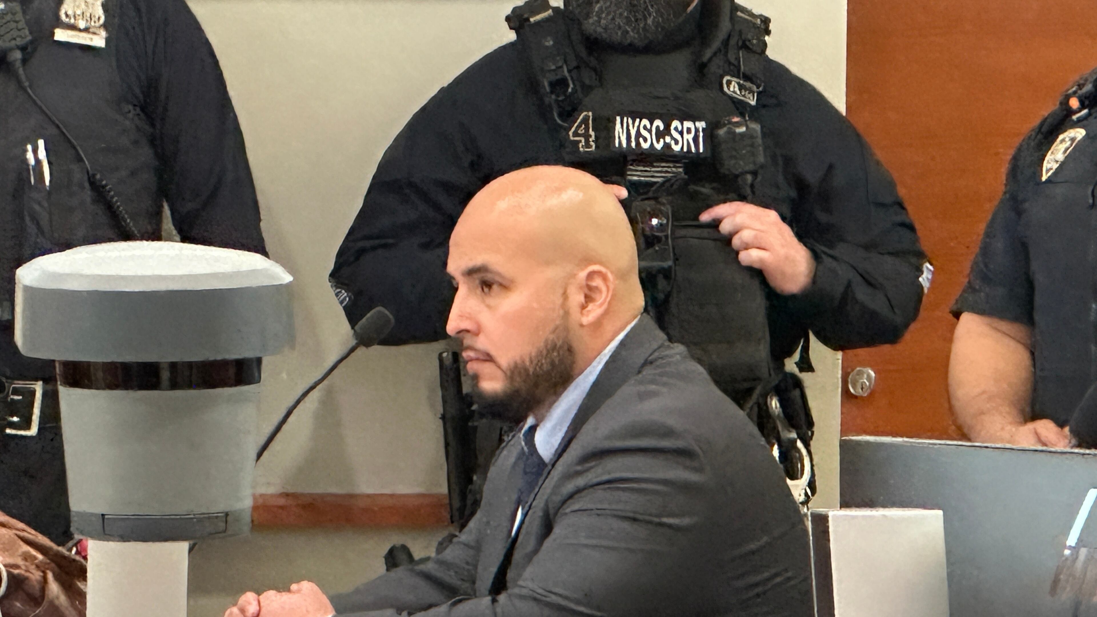 Former New York City police sergeant Erik Duran is seated during his sentencing hearing at the Bronx County Hall of Justice Thursday, April 9, 2026, New York, for tossing a picnic cooler full of drinks at a fleeing suspect, Eric Duprey, who then crashed his motorized scooter and died. (AP Photo/Michael R. Sisak)