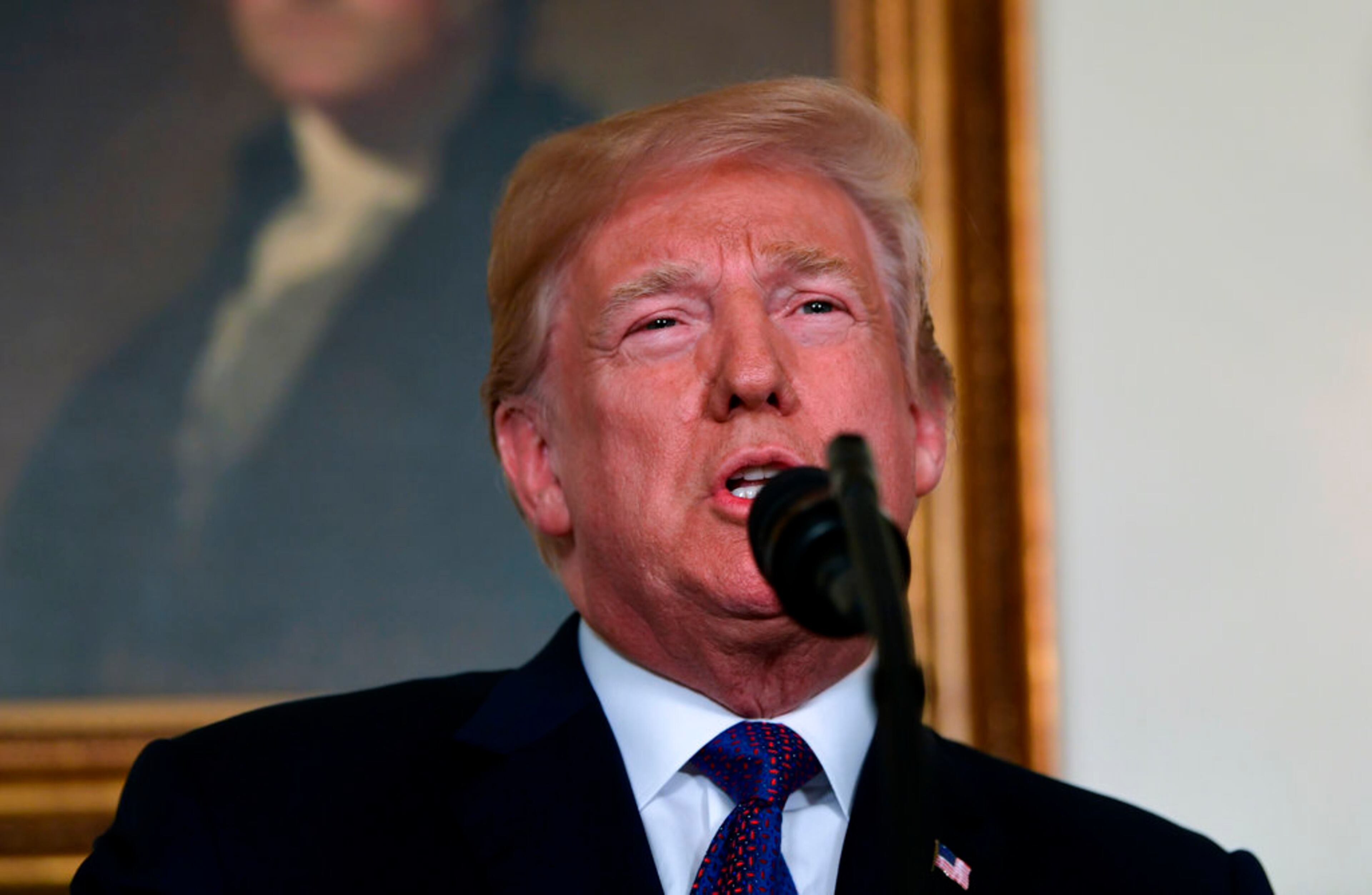 President Donald Trump speaks in the Diplomatic Reception Room of the White House on Friday, April 13, 2018, in Washington, about the United States' military response to Syria's chemical weapon attack on April 7. (AP Photo/Susan Walsh)