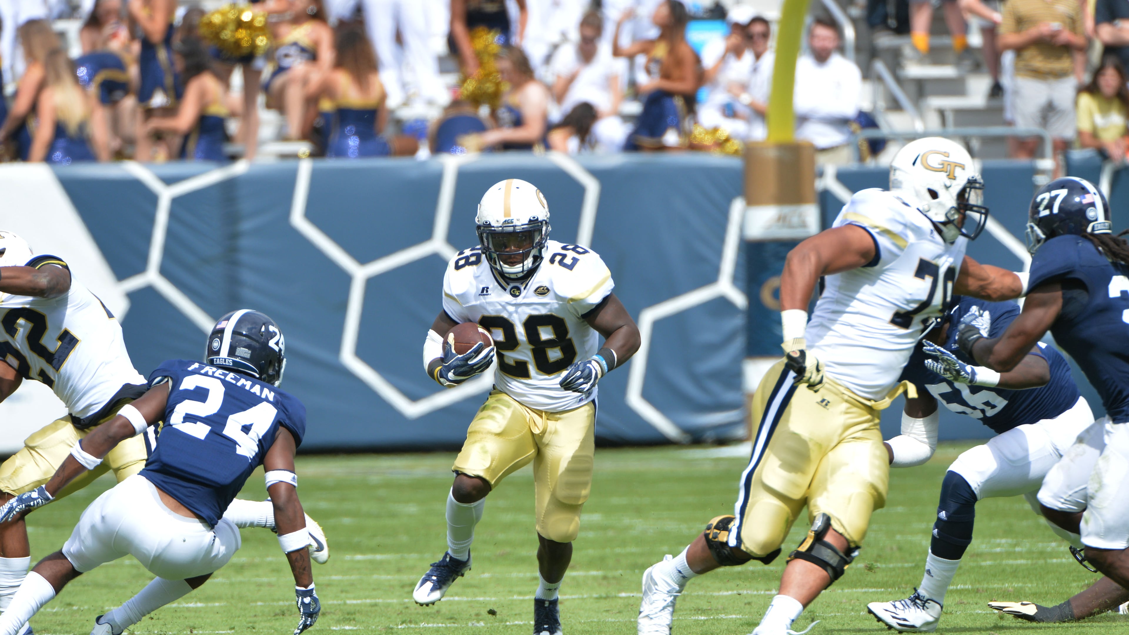Georgia Tech running back J.J. Green (28) runs against Georgia Southern defensive back Sean Freeman (24) in the first half at Bobby Dodd Stadium on Saturday, October 15, 2016. HYOSUB SHIN / HSHIN@AJC.COM