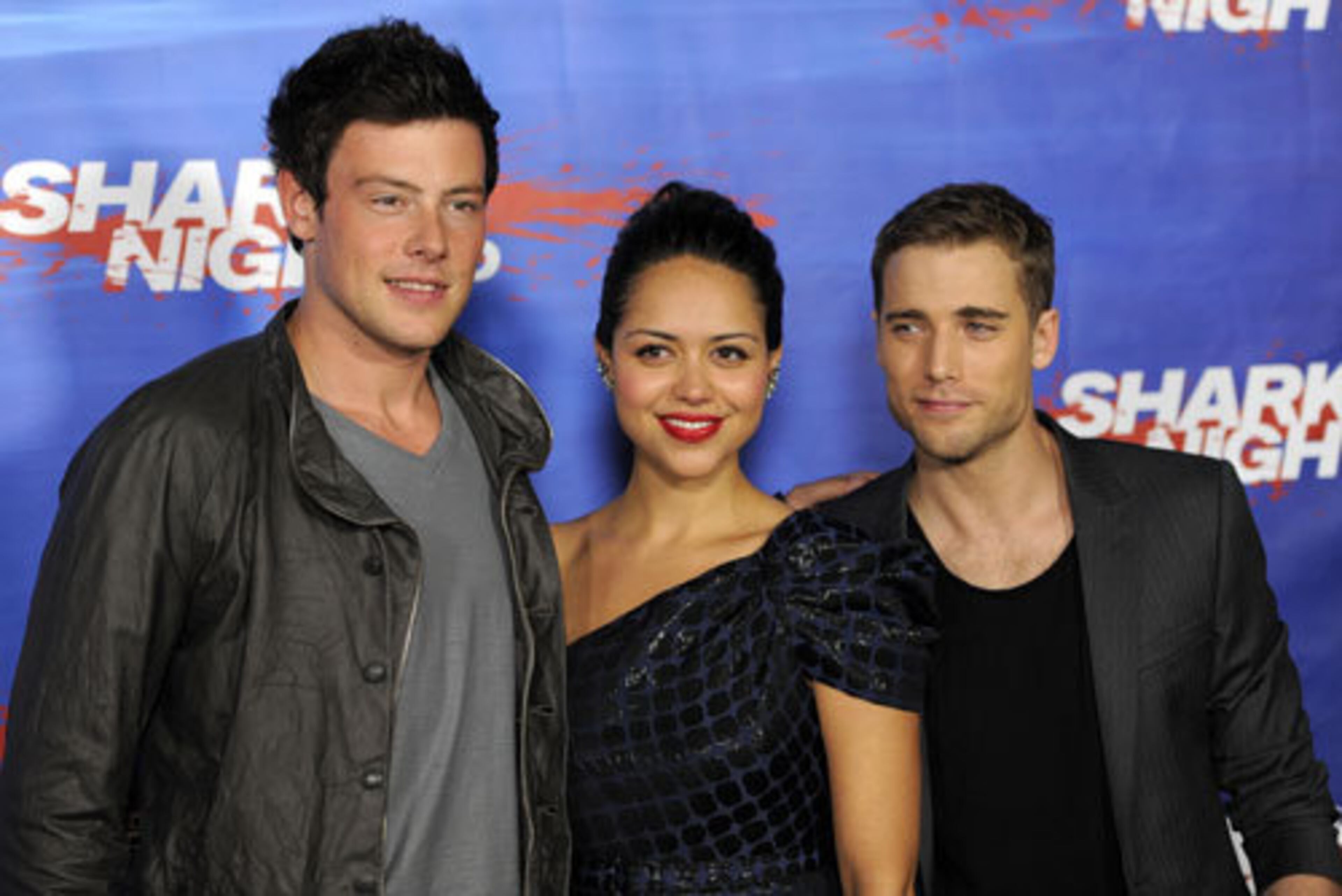 Actor Cory Monteith attends the premiere with cast members Alyssa Diaz and Dustin Milligan.