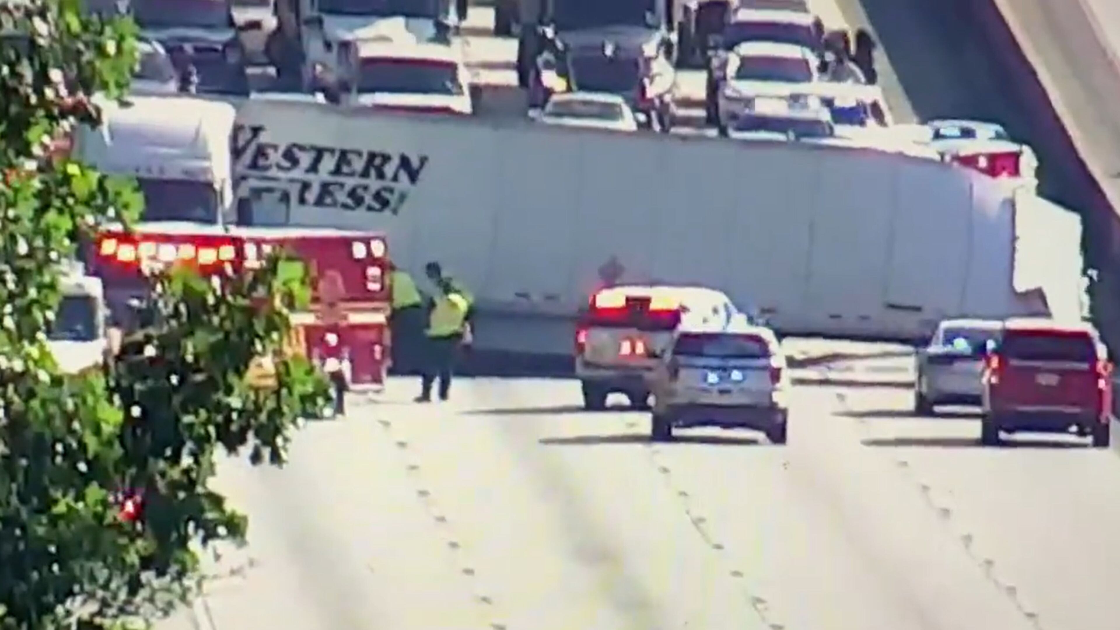 A tractor-trailer sat horizontal across the southbound lanes of I-85 in Fairburn on Tuesday after a crash, creating miles of backups.