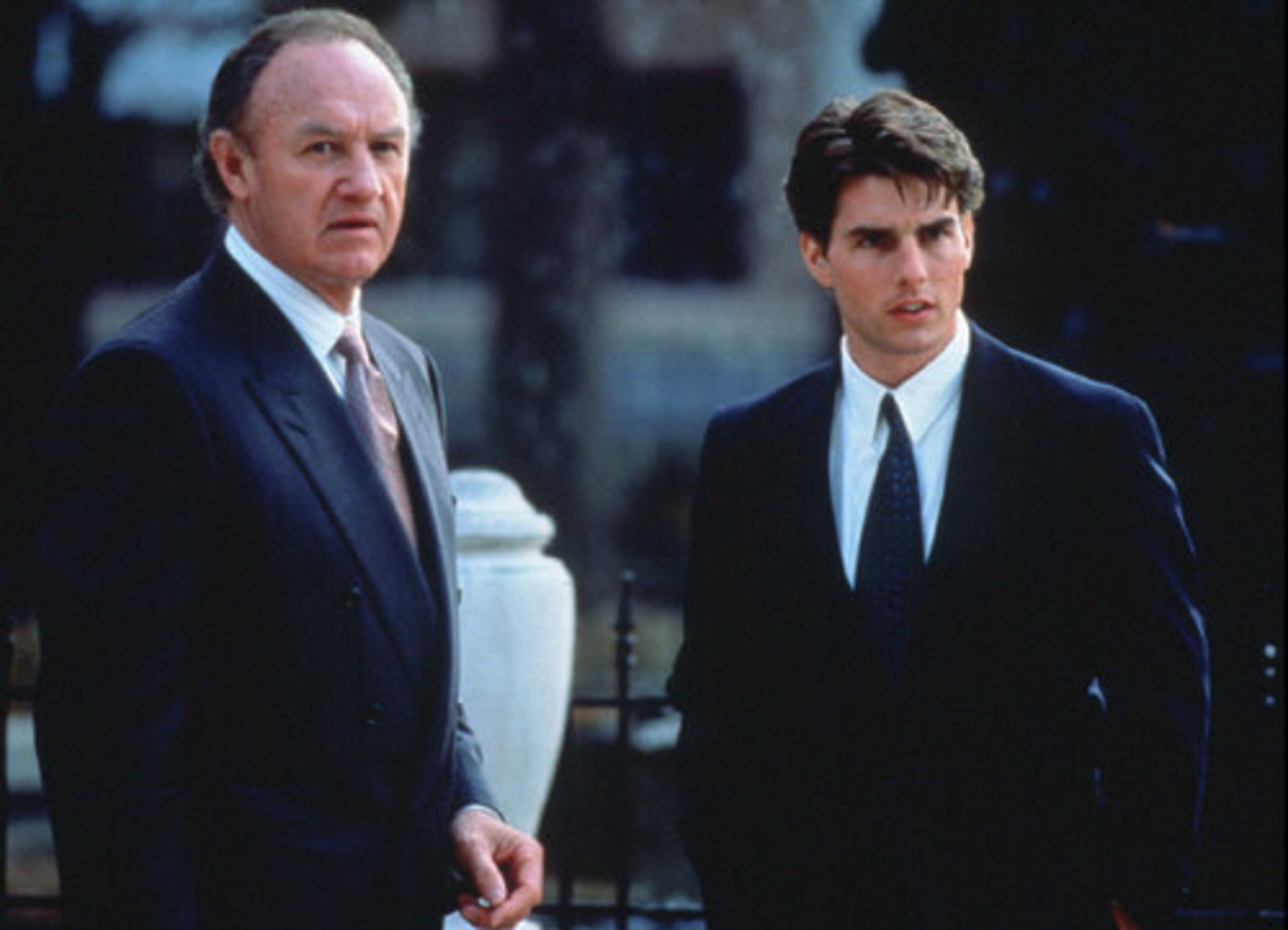 "The Firm" (1993): Pollack directed Tom Cruise (right) and Academy Award-winner Gene Hackman in this movie based on a John Grisham novel. Cruise stars as an idealistic, ambitious Ivy League graduate who accepts a lucrative offer from presigious law firm but soon regrets it. It received two Oscar nominations.
