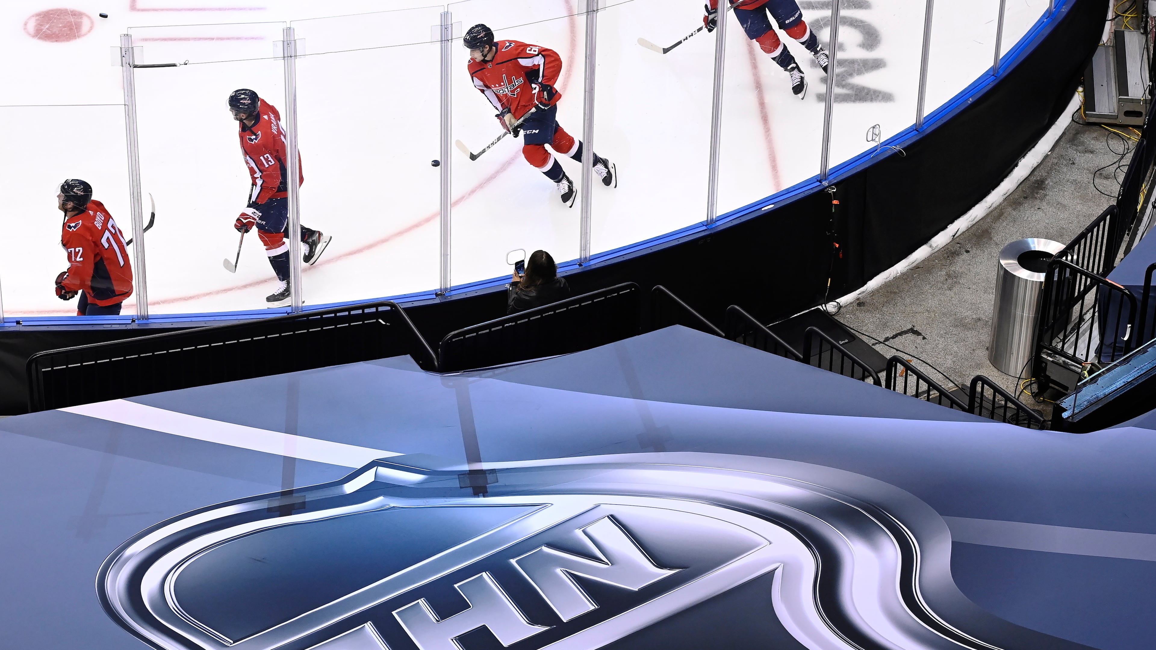 FILE - An NHL logo is displayed on Aug. 14, 2020, prior to the NHL Eastern Conference Stanley Cup playoff hockey game in Toronto. (Nathan Denette/The Canadian Press via AP, File)