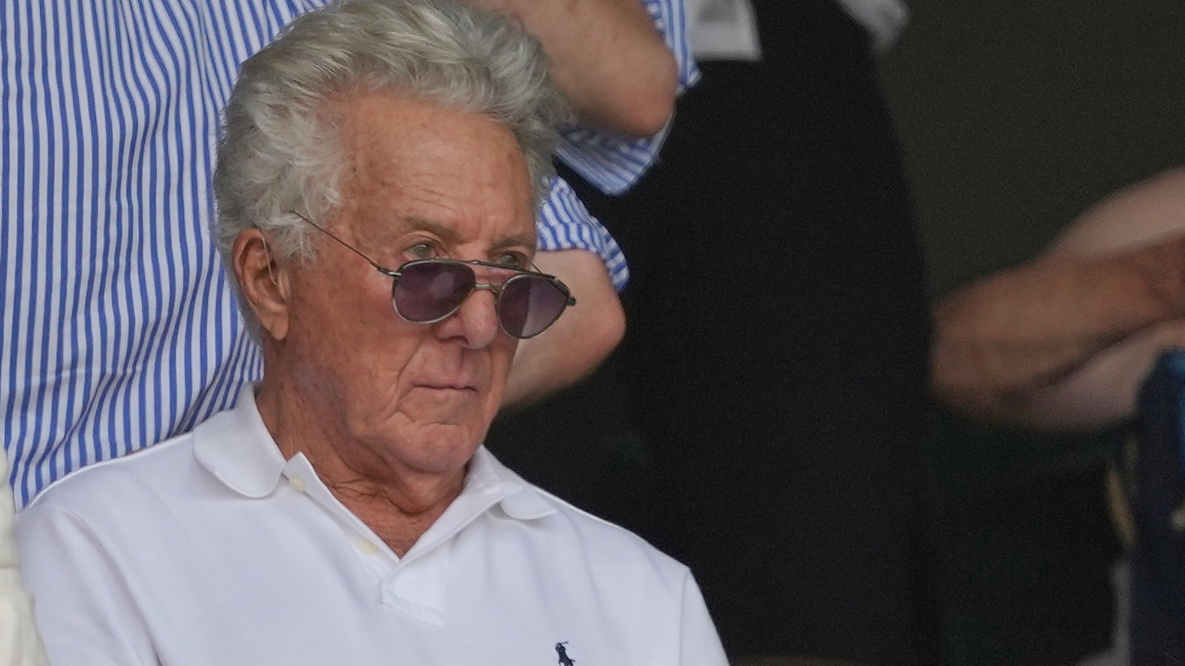 Actor Dustin Hoffman watches a Alexander Zverev of Germany defeats Arthur Fery of Britain during their men's singles semifinal match at the Wimbledon Tennis Championships in London, Friday, July 10, 2026. (AP Photo/Kirsty Wigglesworth)