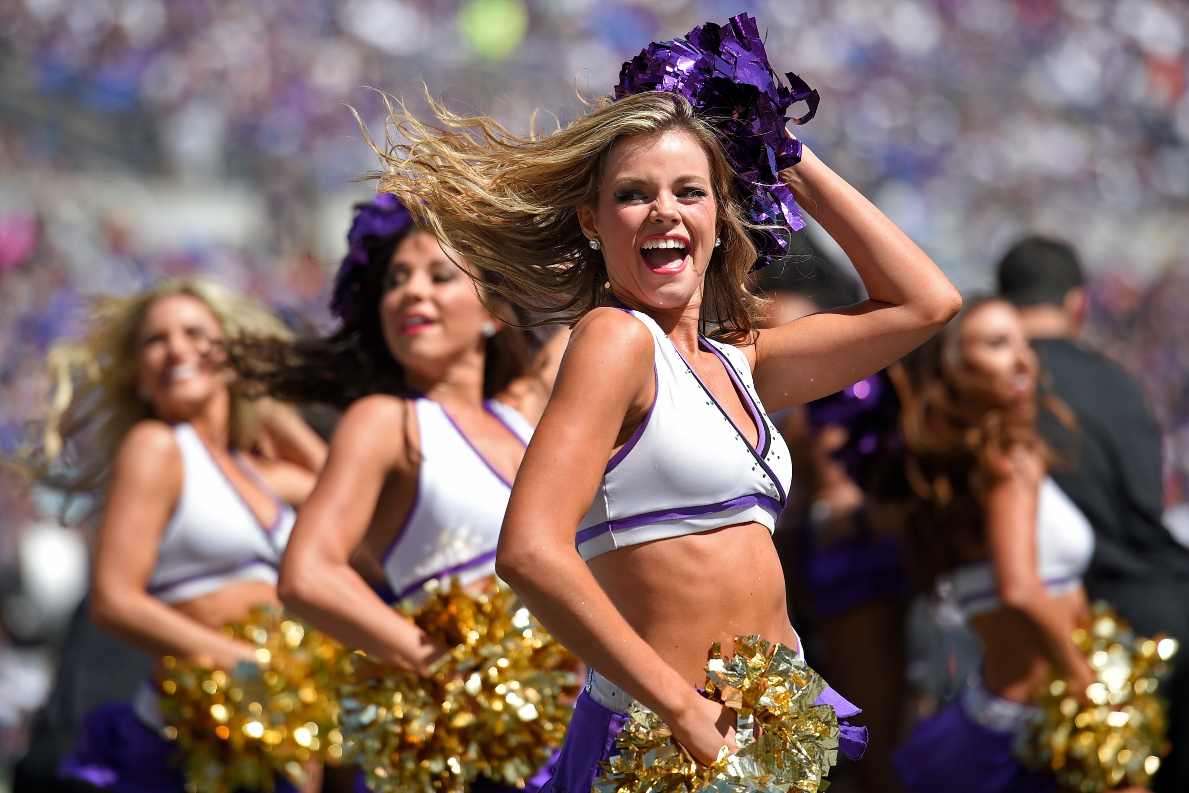 The Baltimore Ravens cheerleaders perform during the first half of an NFL football game against the Cincinnati Bengals in Baltimore, Md., Sunday, Sept. 7, 2014. (AP Photo/Nick Wass)