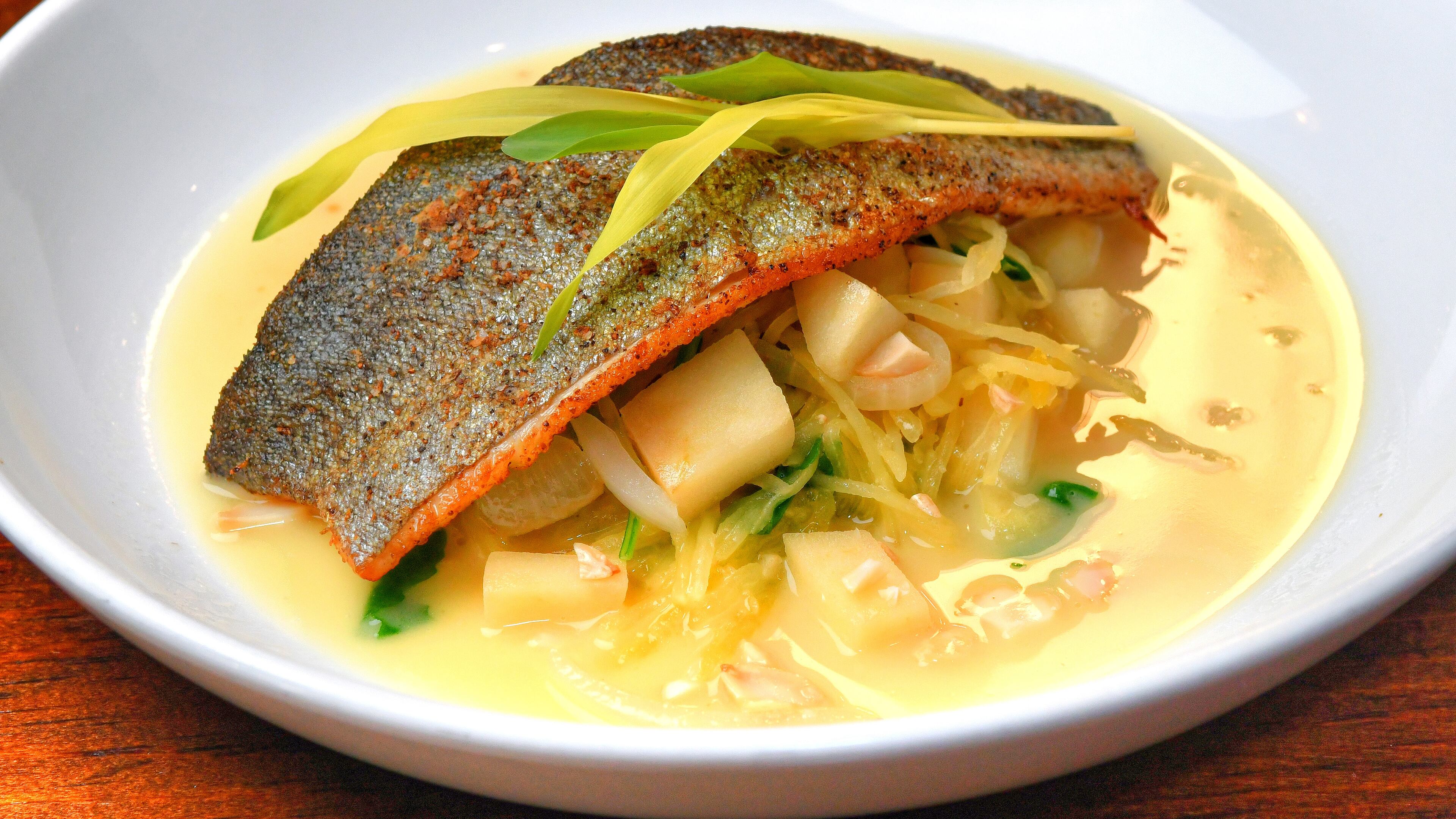 201007 Decatur, Ga: Brick Store Pub's Pan Seared Trout Fillet with Spaghetti Squash, Apples, and Arugula. For From the Menu 102920. Photos taken October 7, 2020 at The Brick Store Pub in Decatur, Ga. (Chris Hunt for The Atlanta Journal-Constitution)