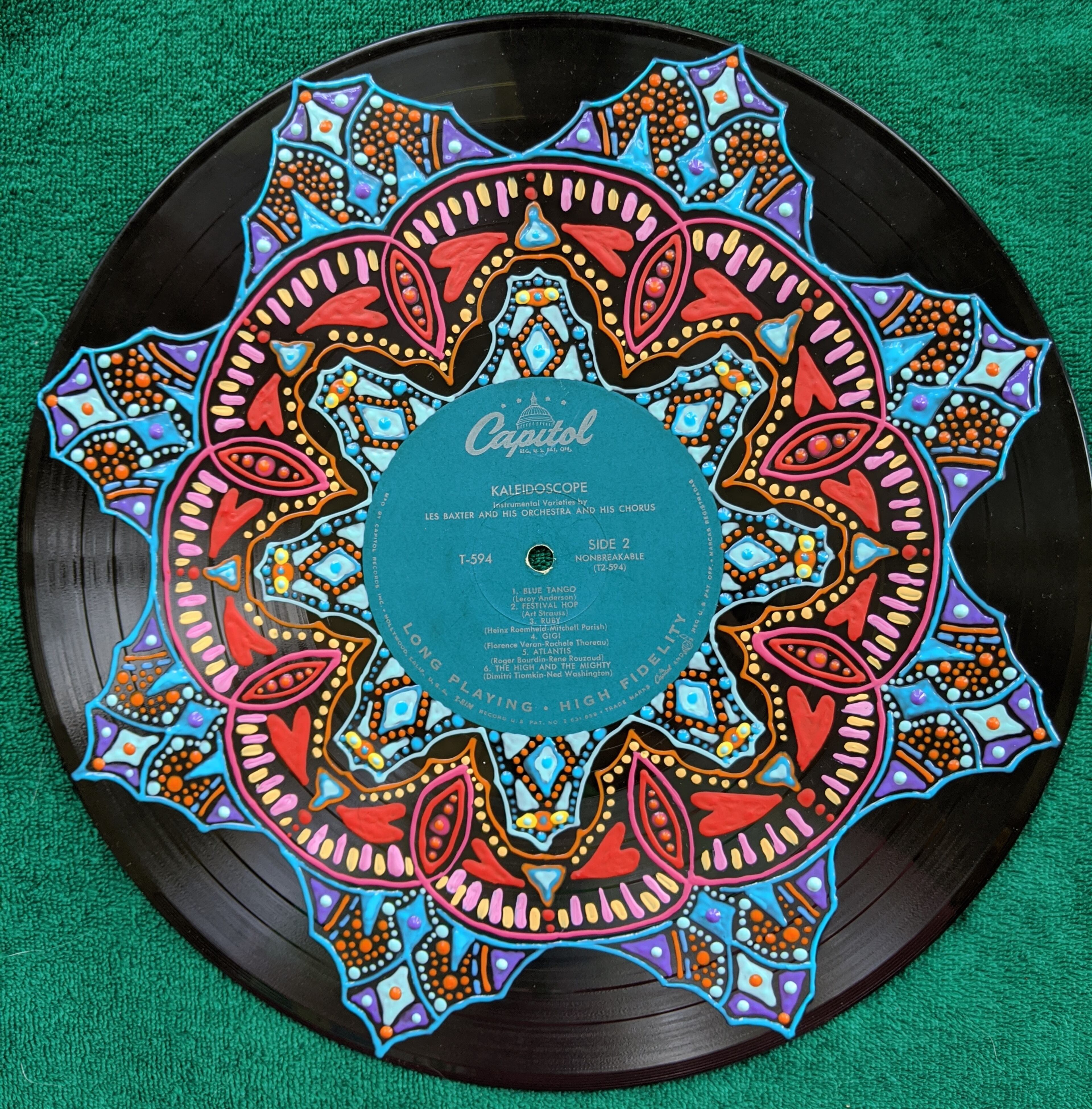 Before the pandemic, Claire Brightly Vohman of Cumming sold her paintings on vinyl records at consignment shops. Now they're available on the Viral Art Facebook page.
Courtesy of Claire Brightly Vohman