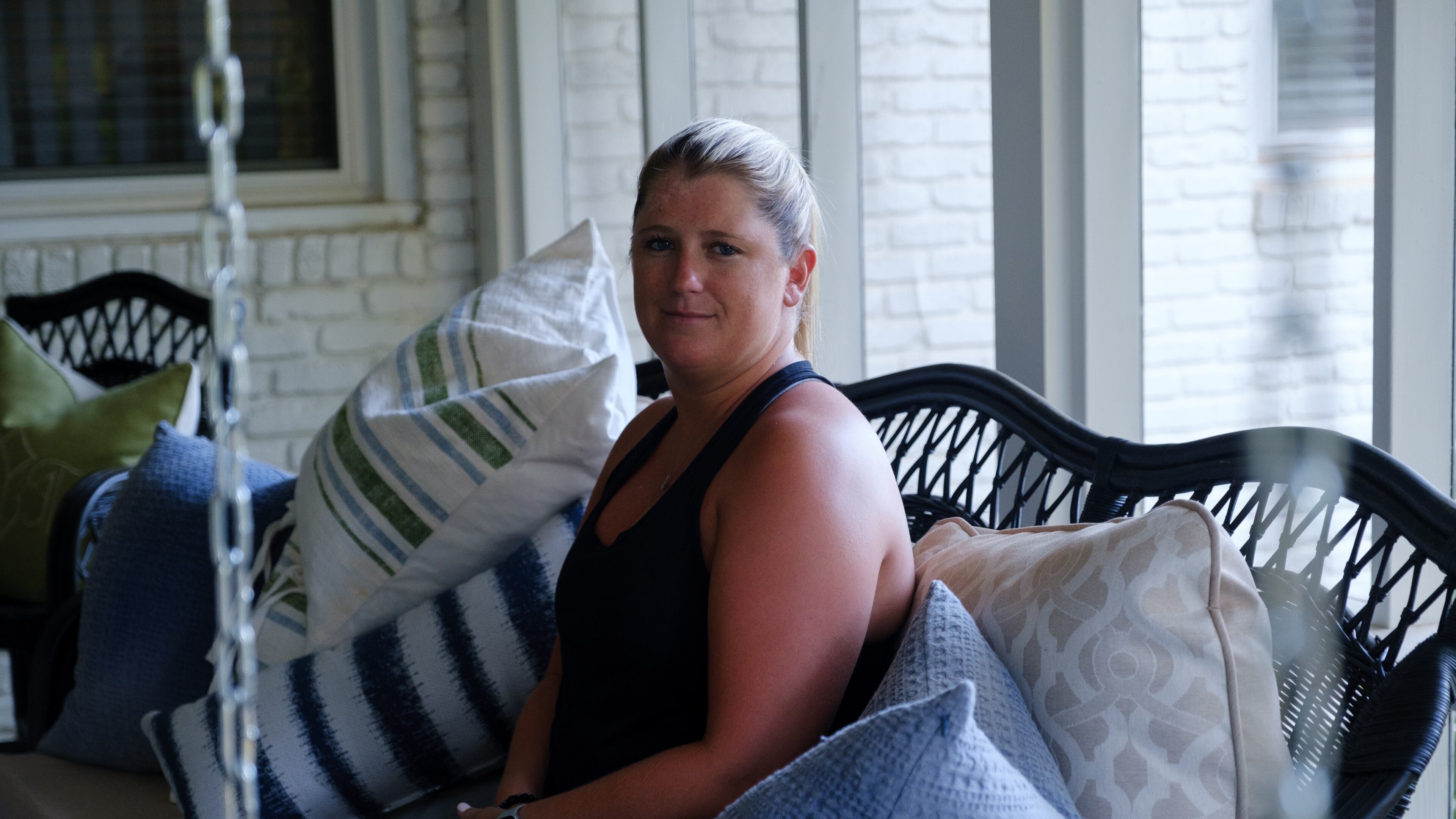 Emily Stevens, a nurse, on her day off in Gainesville. Stevens left her previous job as a staff ER nurse in Gainesville, where she worked some of the worst shifts in the pandemic. She joined an agency as a "traveler," or contract nurse, and is now an ER nurse in Duluth. She is run less ragged by her shifts, and feels she can work on restoring her health now on her days off. (PHOTO by Arvin Temkar / arvin.temkar@ajc.com)