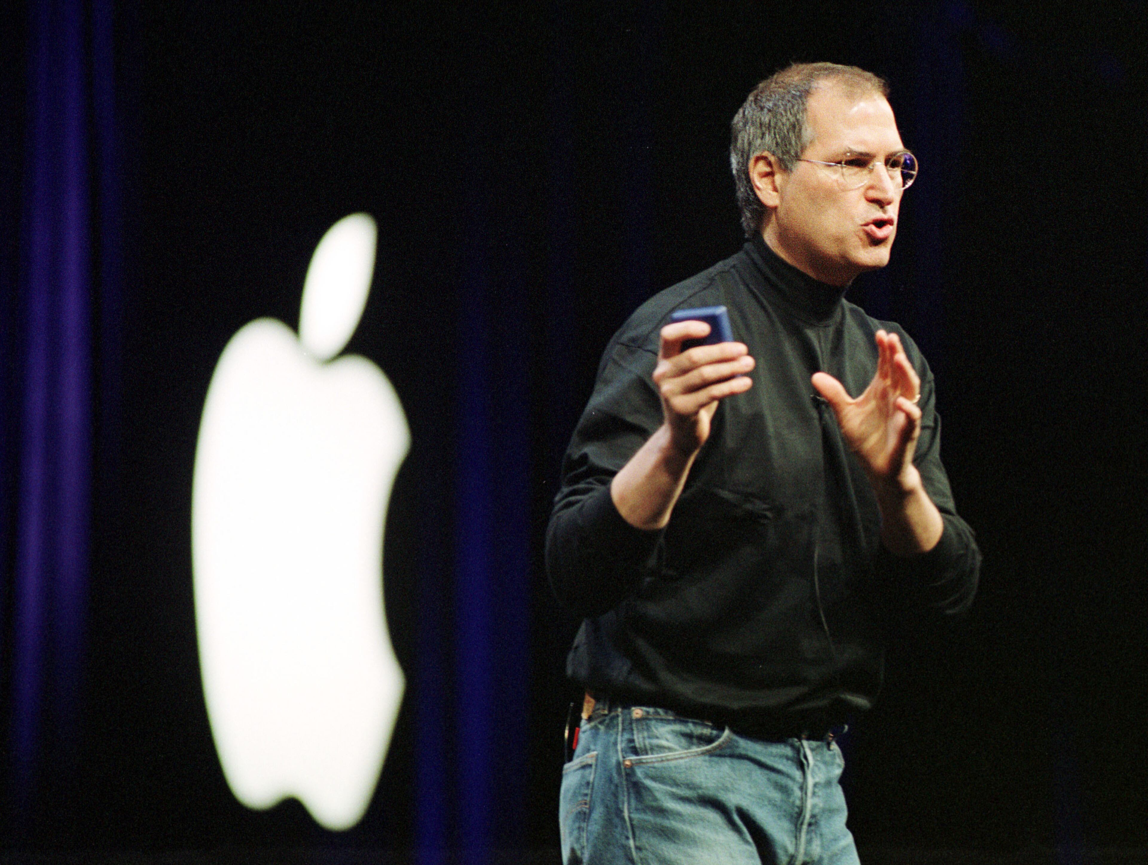 Apple Computers Inc. CEO Steve Jobs delivers the keynote address at Macworld January 7, 2002 in San Francisco, CA. Jobs introduced new products, including a new iBook and the upgraded iMac, and software. (Photo by Dan Krauss/Getty Images)