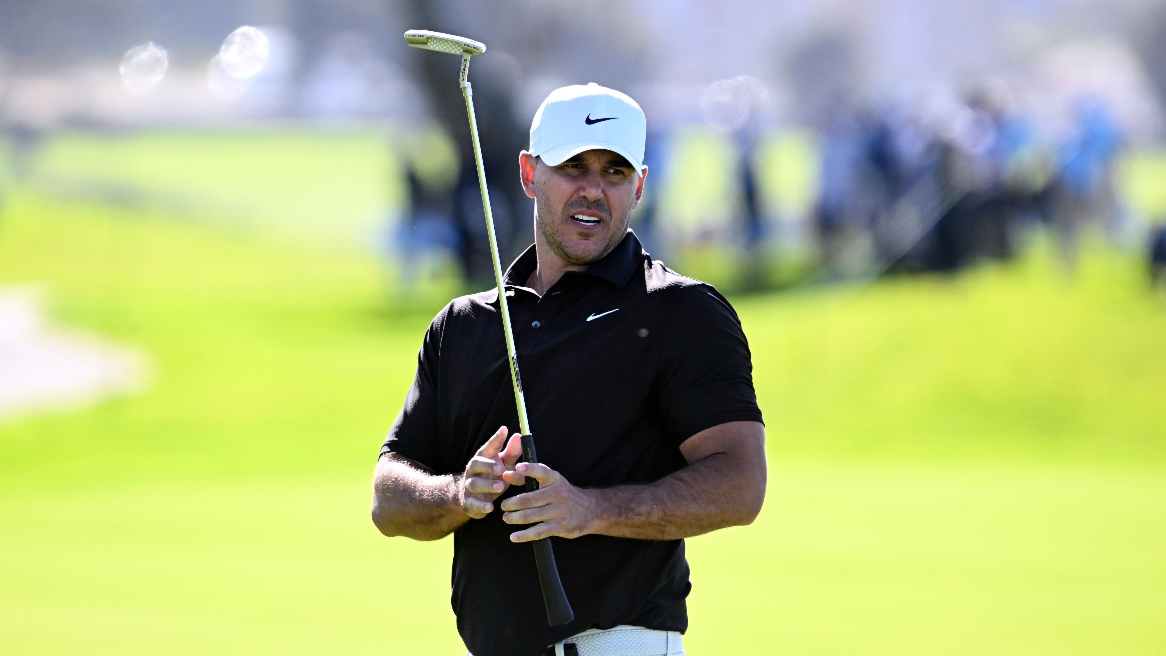 Brooks Koepka reacts after missing a birdie putt on the fourth hole on the South Course at Torrey Pines during the first round of the Farmers Insurance Open golf tournament Thursday, Jan. 29, 2026, in San Diego. (AP Photo/Denis Poroy)