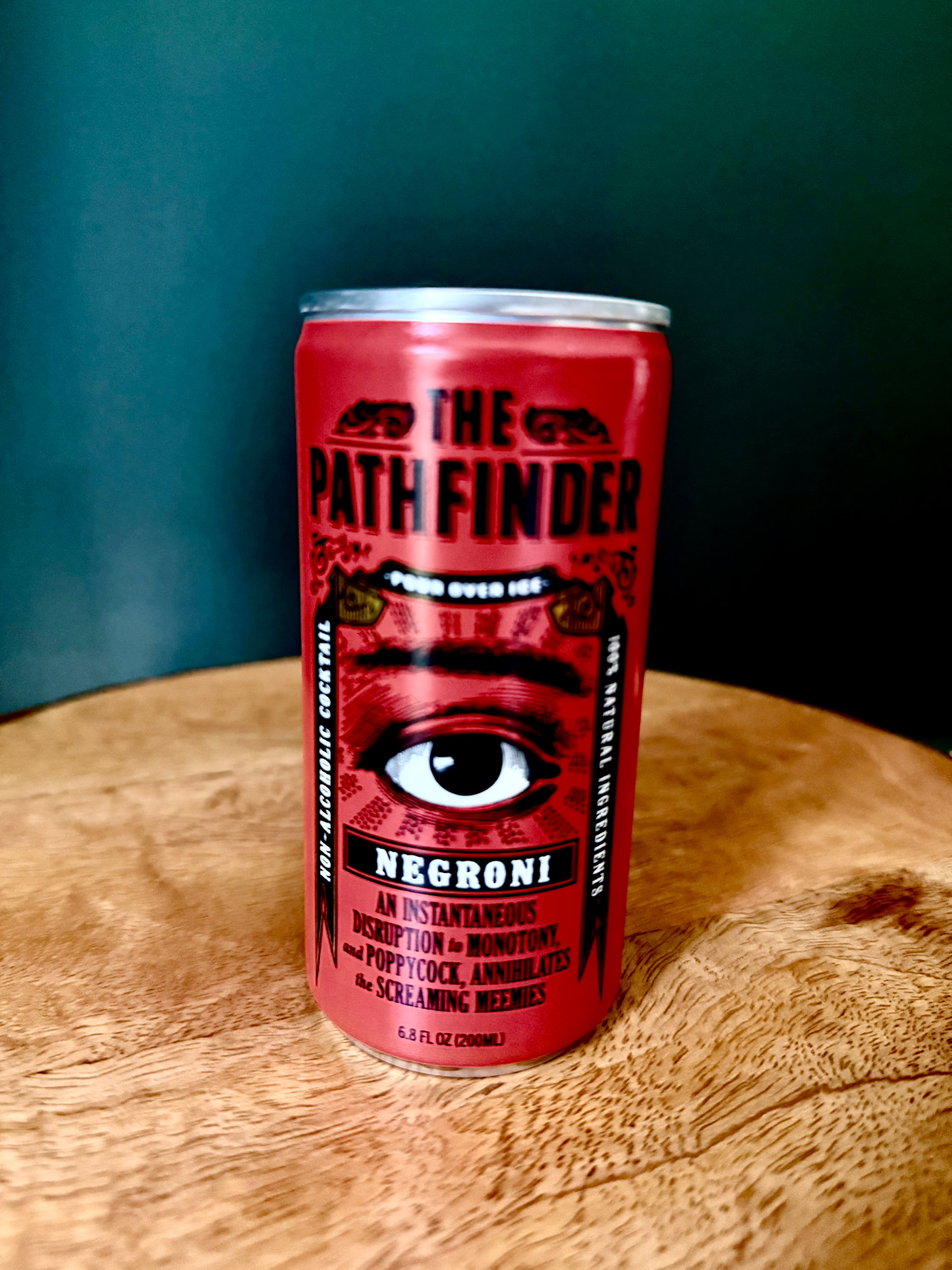 The Pathfinder Negroni is nonalcoholic, but tastes like an amaro-forward Negroni when poured over ice. (Angela Hansberger for the AJC)