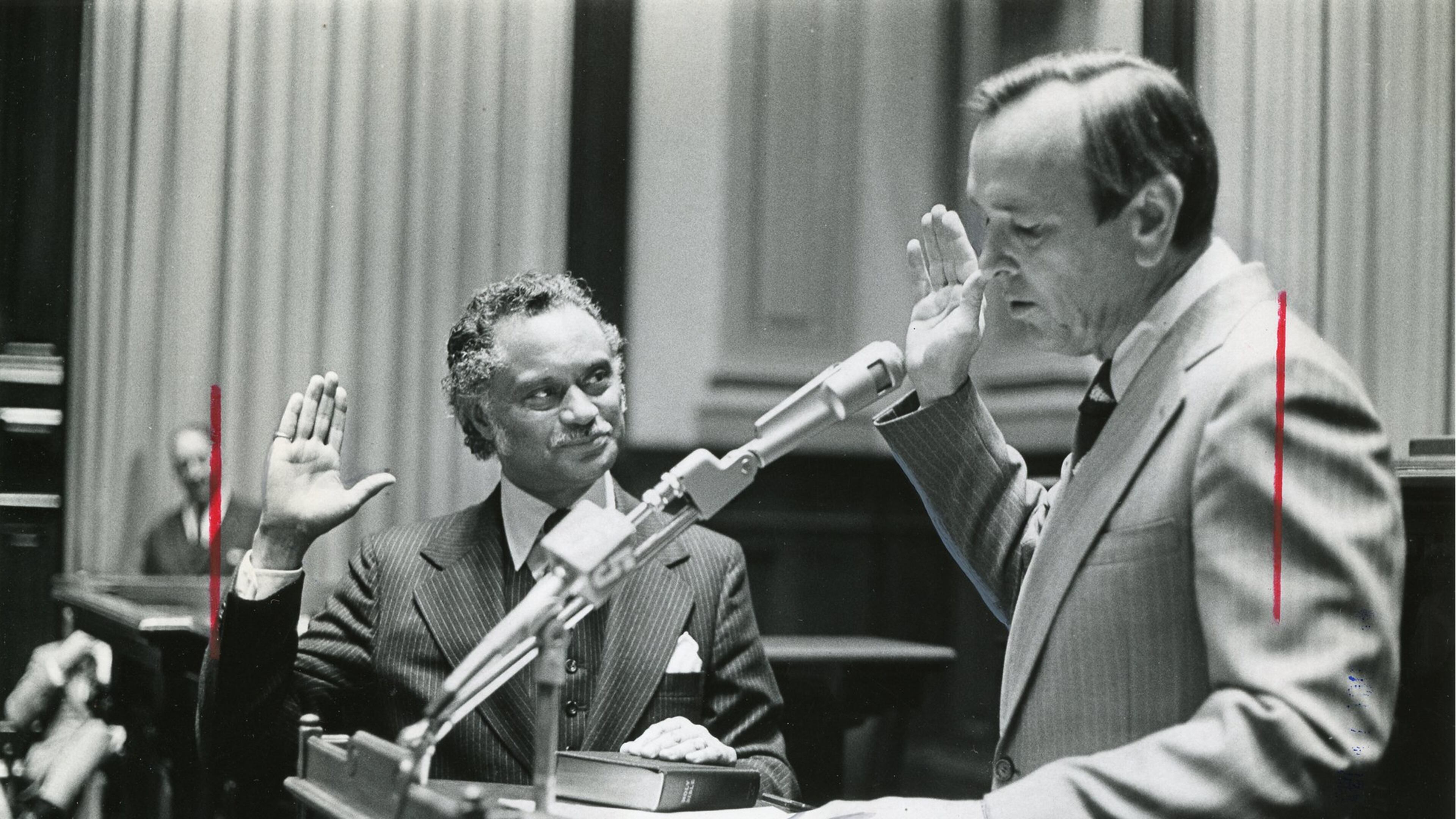 The newspaper caption for this photo read: “Gov. George Busbee swears in Horace Ward. A long route to the Superior Court.” The caption is stamped “Mar 0 6 1977 JNL.-CONSTI.” The print verso is date-stamped “Thu Nov 2 1979,” the probable date of this print. (Atlanta Journal-Constitution Photographic Archive)