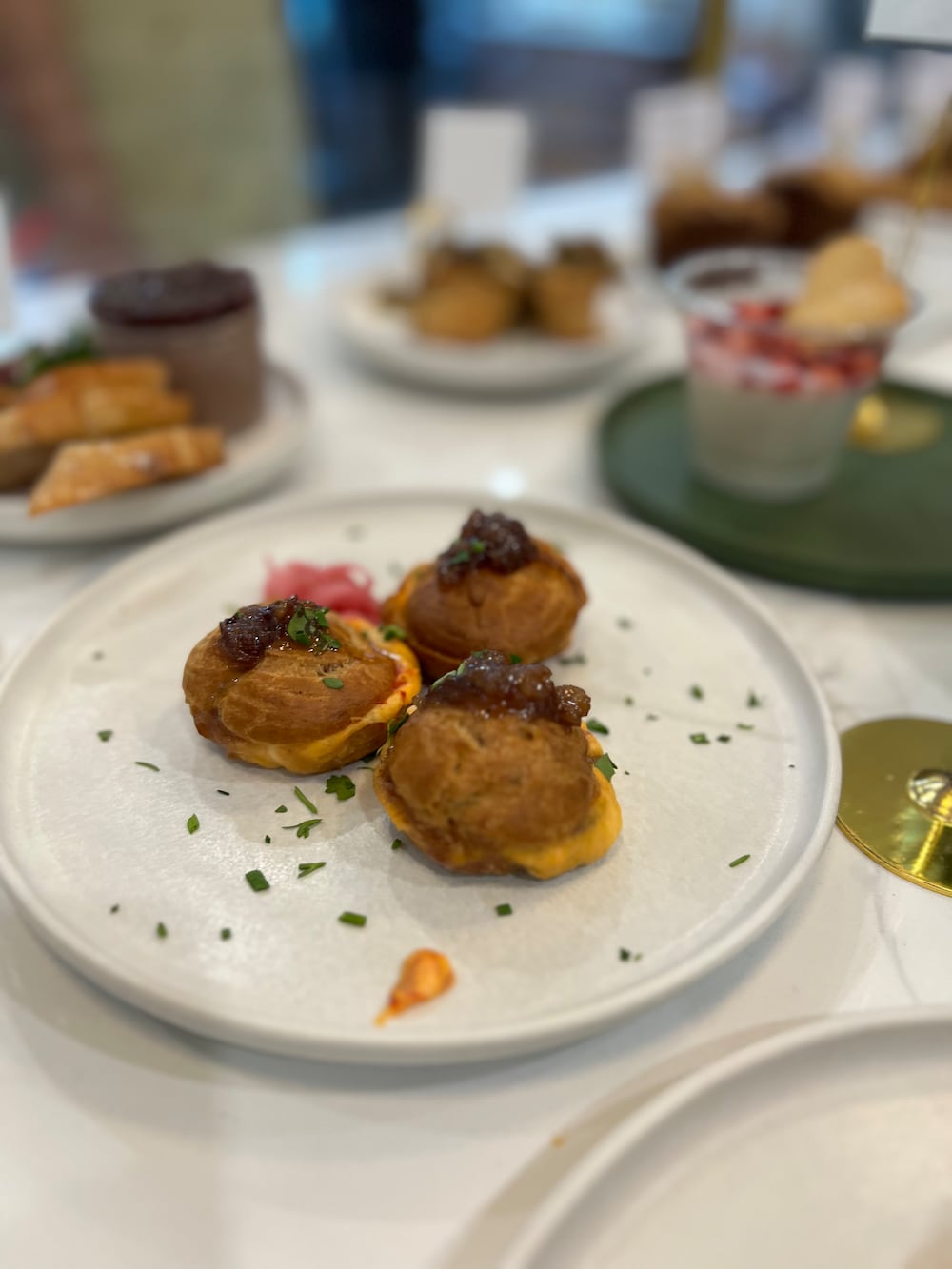 Galettes pimento cheese and bacon jam profiteroles. (Courtesy of Morgan Perkins)