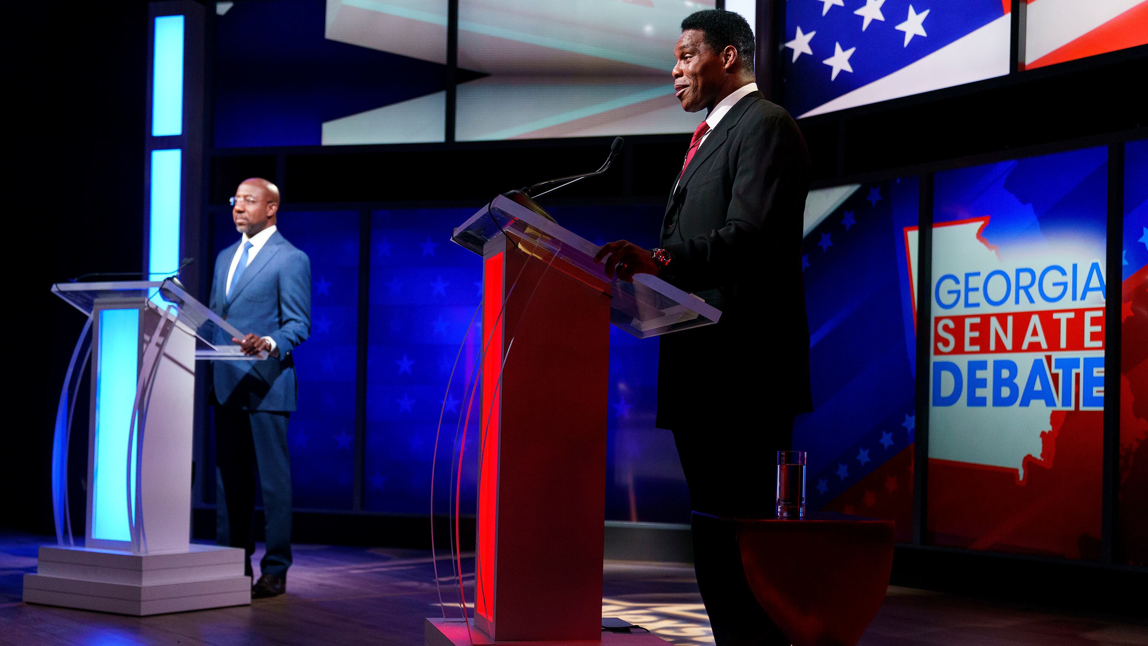 Sen. Raphael Warnock (D-Ga.) and Georgia Republican Senate candidate Herschel Walker participate in the Nexstar Georgia Senate Debate at District Live at Plant Riverside District in Savannah, Ga., on Friday, October 14, 2022.
