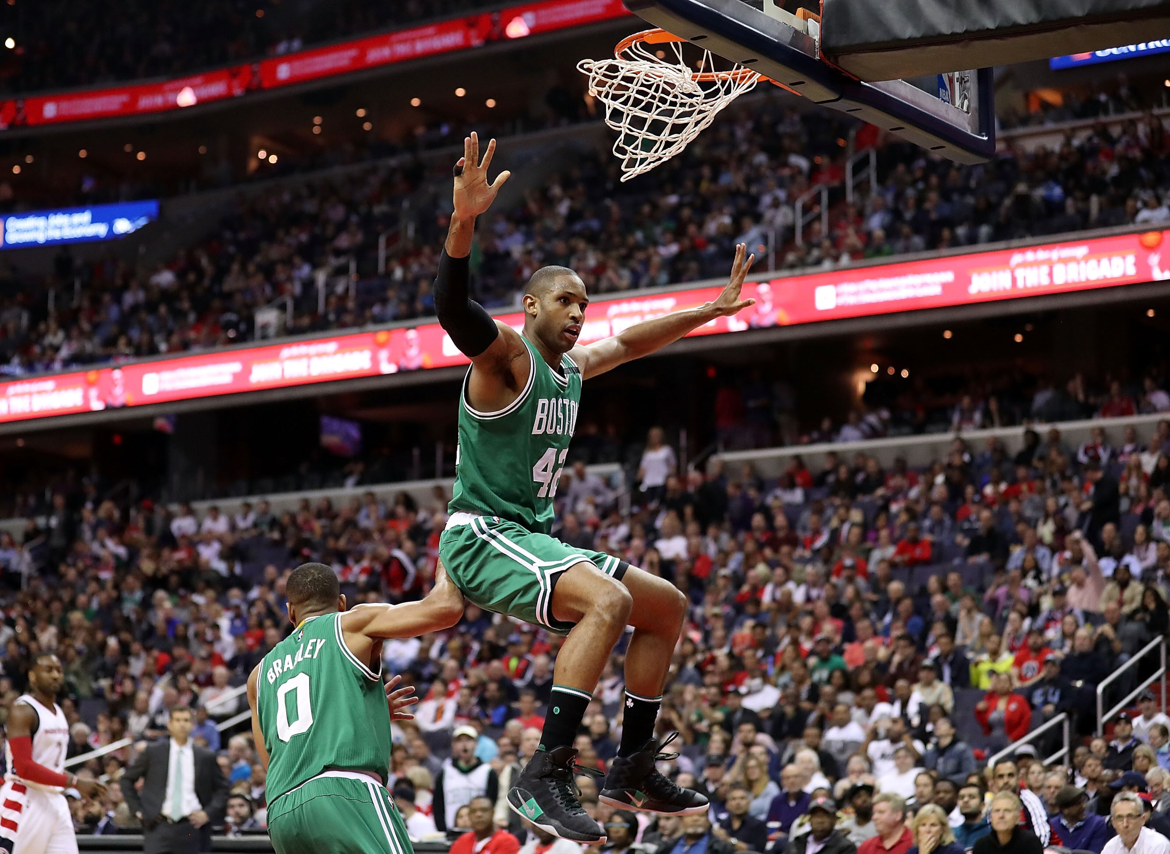 WASHINGTON, DC - MAY 12: Al Horford #42 of the Boston Celtics dunks against Bradley Beal #3 of the Washington Wizards during Game Six of the NBA Eastern Conference Semi-Finals at Verizon Center on May 12, 2017 in Washington, DC. NOTE TO USER: User expressly acknowledges and agrees that, by downloading and or using this photograph, User is consenting to the terms and conditions of the Getty Images License Agreement. (Photo by Rob Carr/Getty Images)