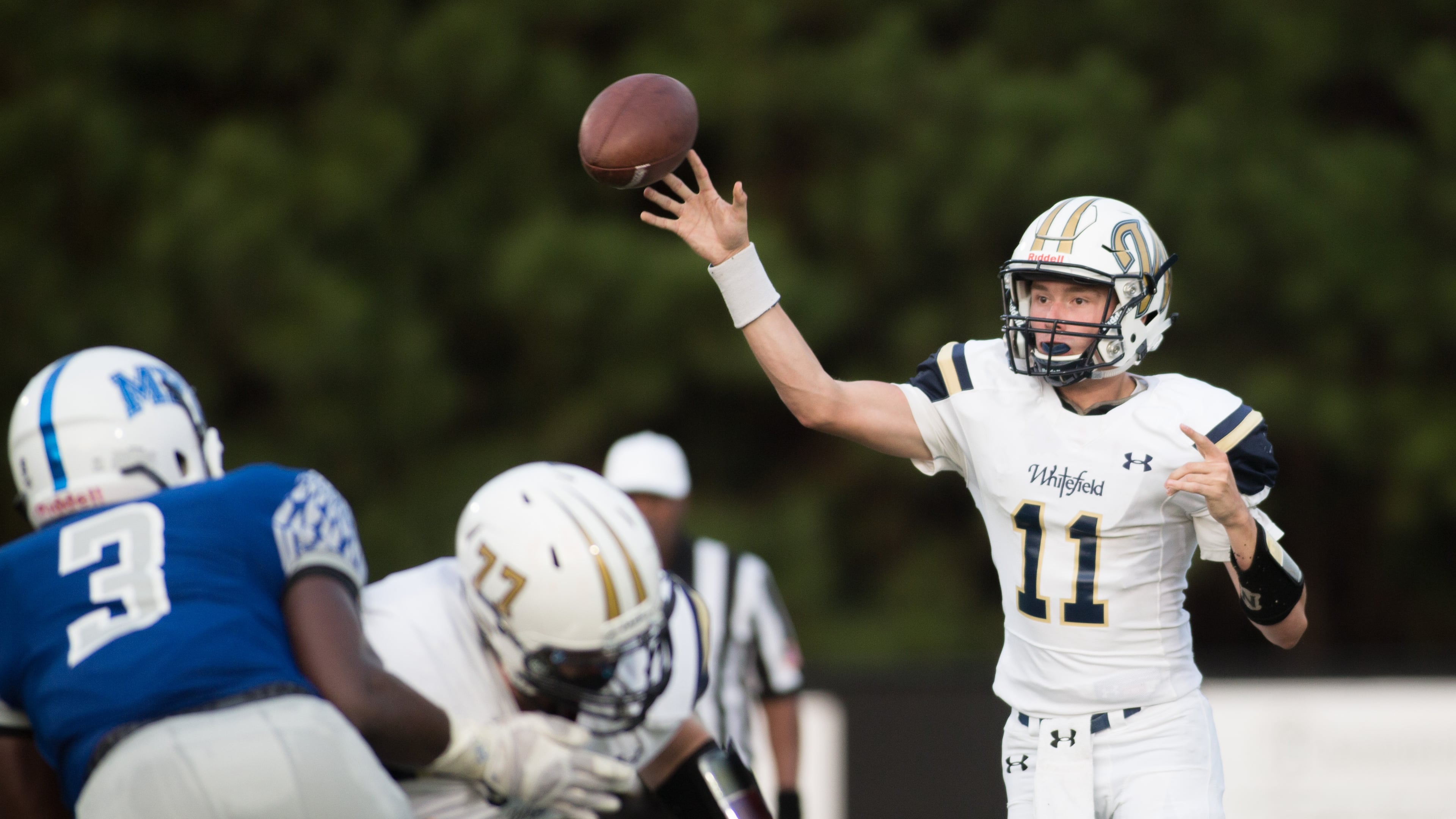 Whitefield Academy quarterback Carson Brown (11) passes the ball during the first half of a high school football game against Mount Paran Christian, Friday, Aug. 28, 2015, in Kennesaw, Ga. BRANDEN CAMP/SPECIAL