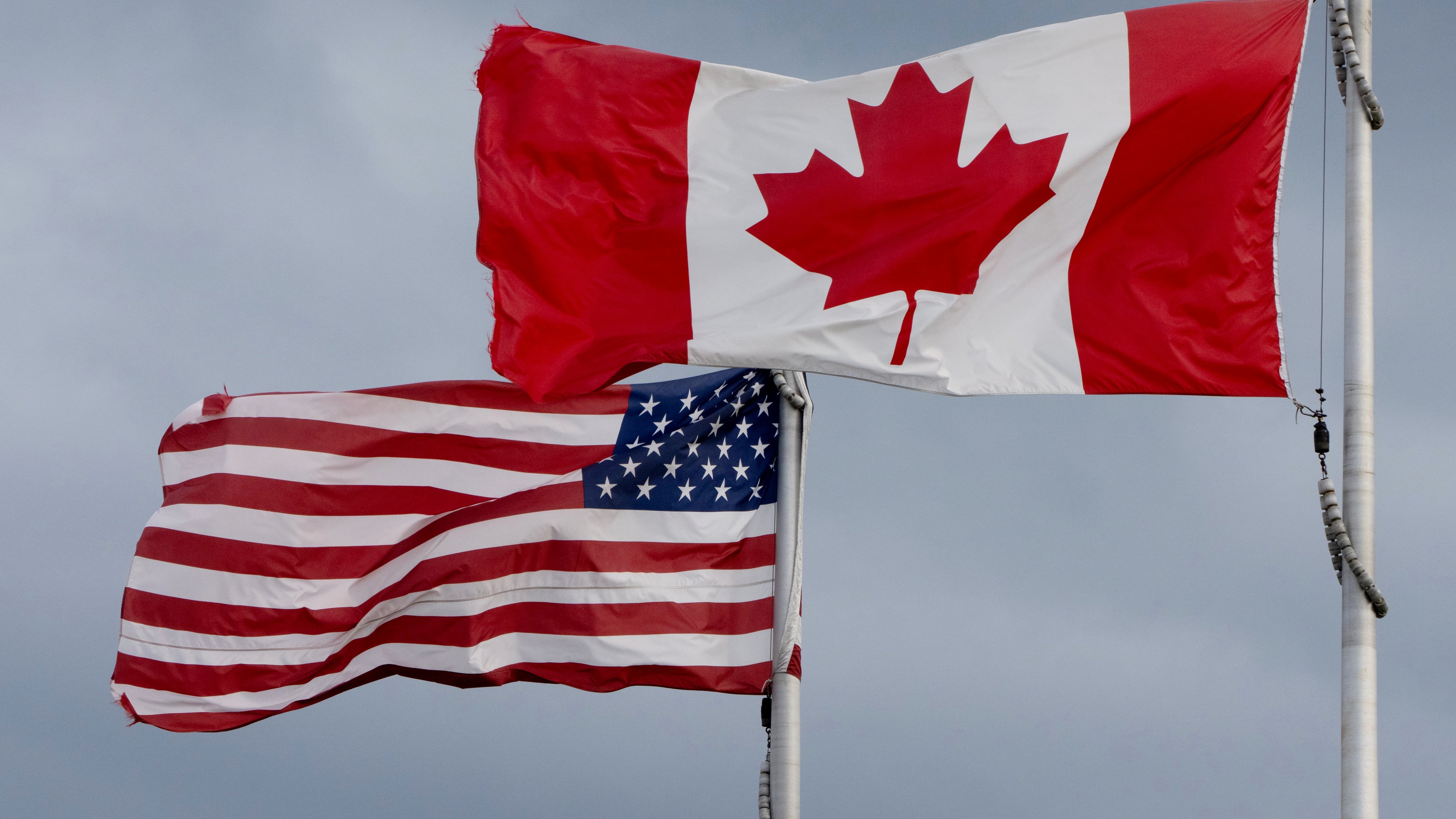 FILE - The flags of Canada and the United States fly in Ottawa, Sept. 12, 2026. (Adrian Wyld/The Canadian Press via AP, File)