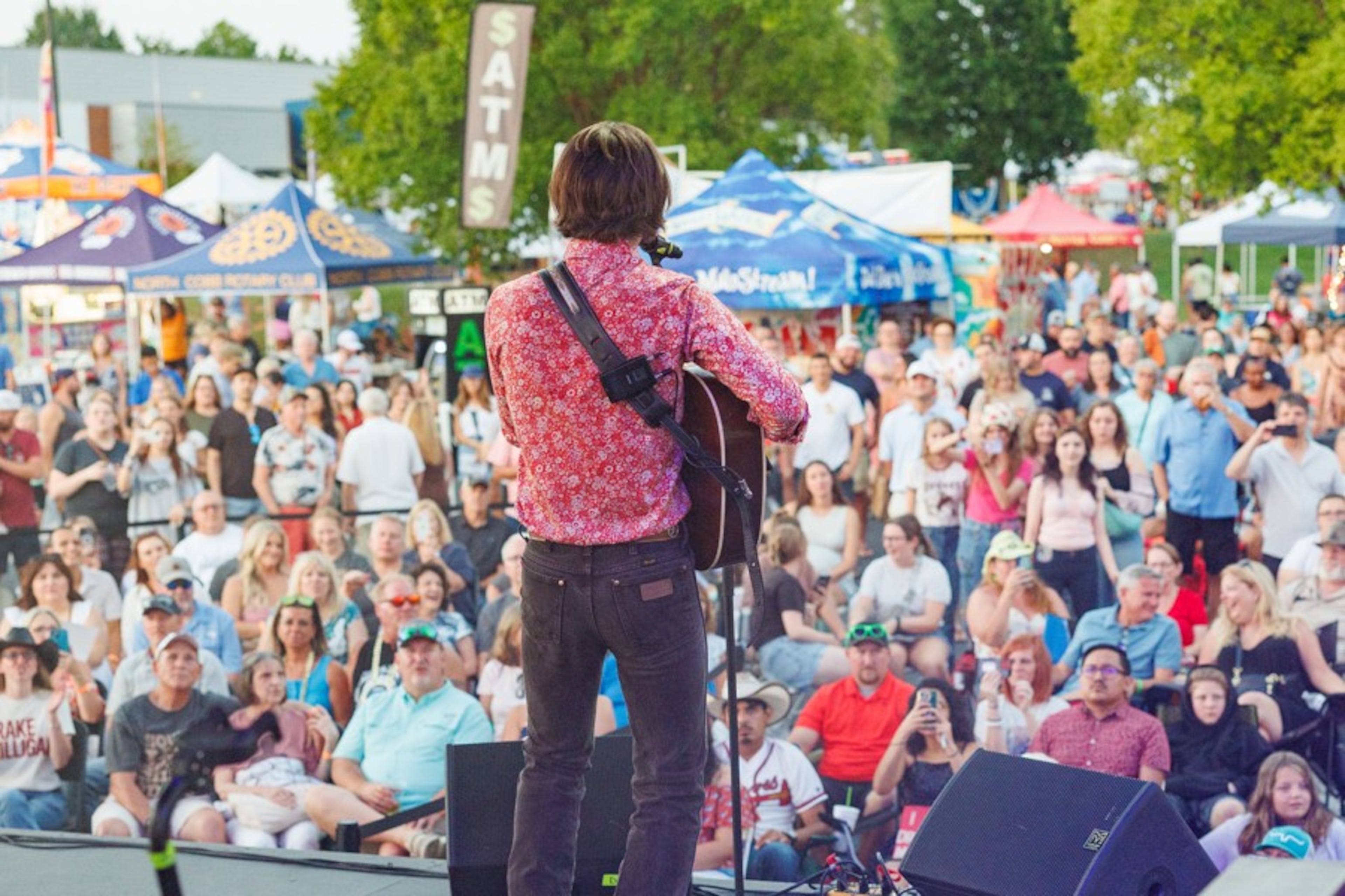 In addition to barbecue and peach-inspired bites, live music is included in the fun at Pigs & Peaches BBQ Festival on Friday night and Saturday.