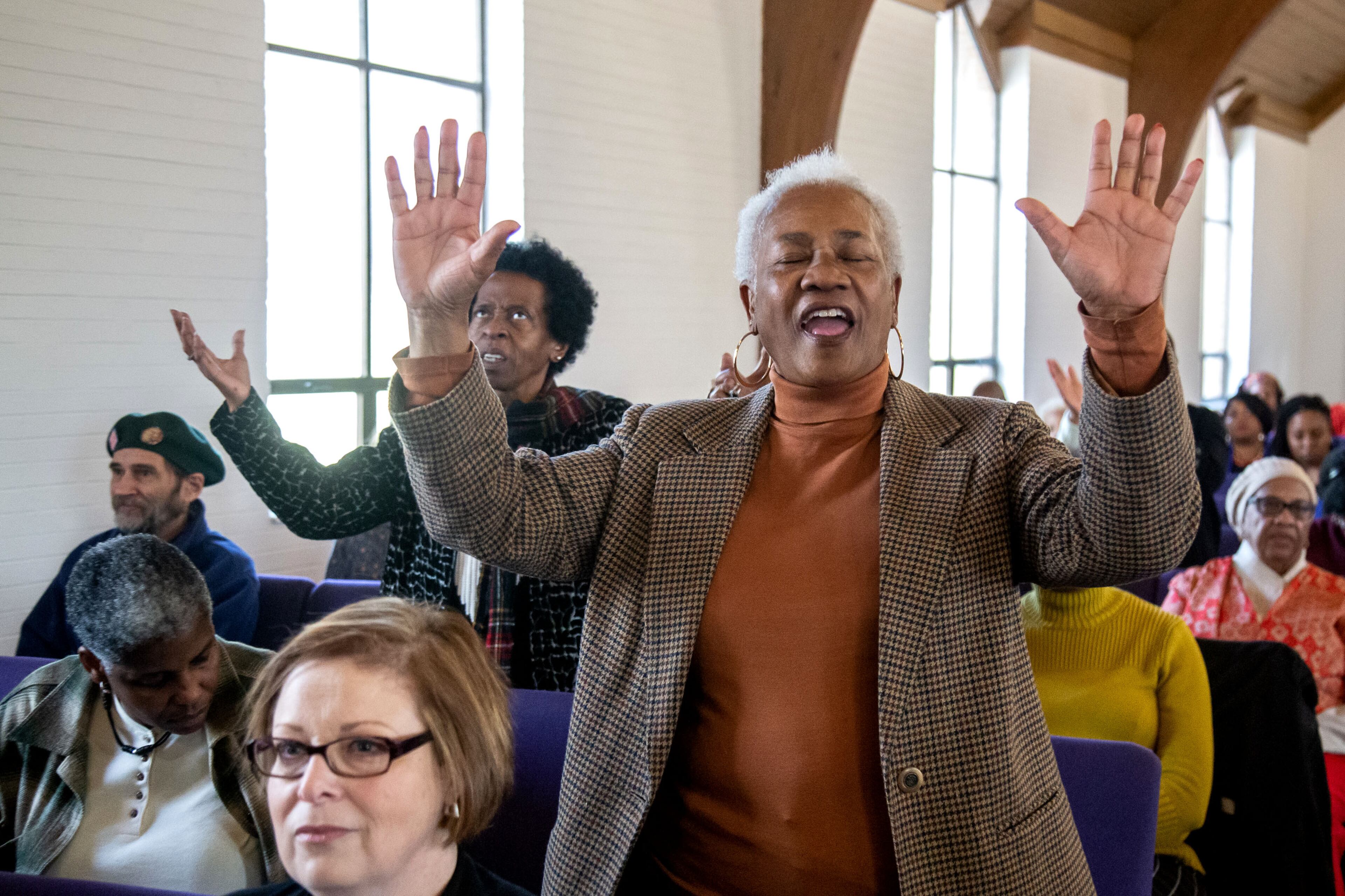 Jacqueline Humphrey sings along to one of the songs performed during the Jubilee Day celebration Wednesday at Park Baptist Church in Decatur, January 1, 2020. STEVE SCHAEFER / SPECIAL TO THE AJC