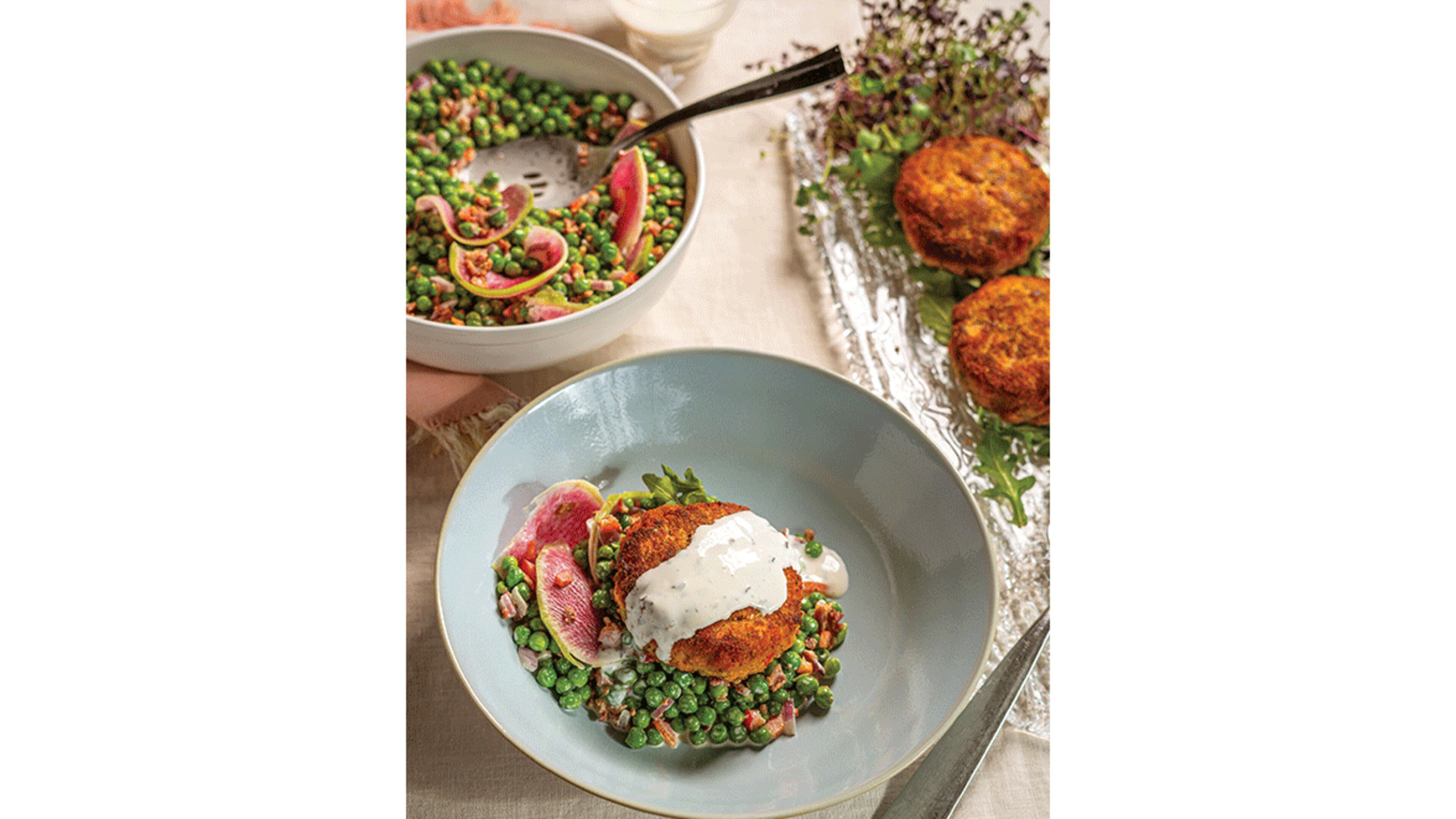 Fresh Salmon Croquettes and Spring Pea, Bacon, and Radish Salad.
© The Twisted Soul Cookbook: Modern Soul Food with Global Flavors by Deborah VanTrece, Rizzoli New York, 2021. Images © Noah Fecks but no image may be used, electronically or in print, without written permission from the publisher.