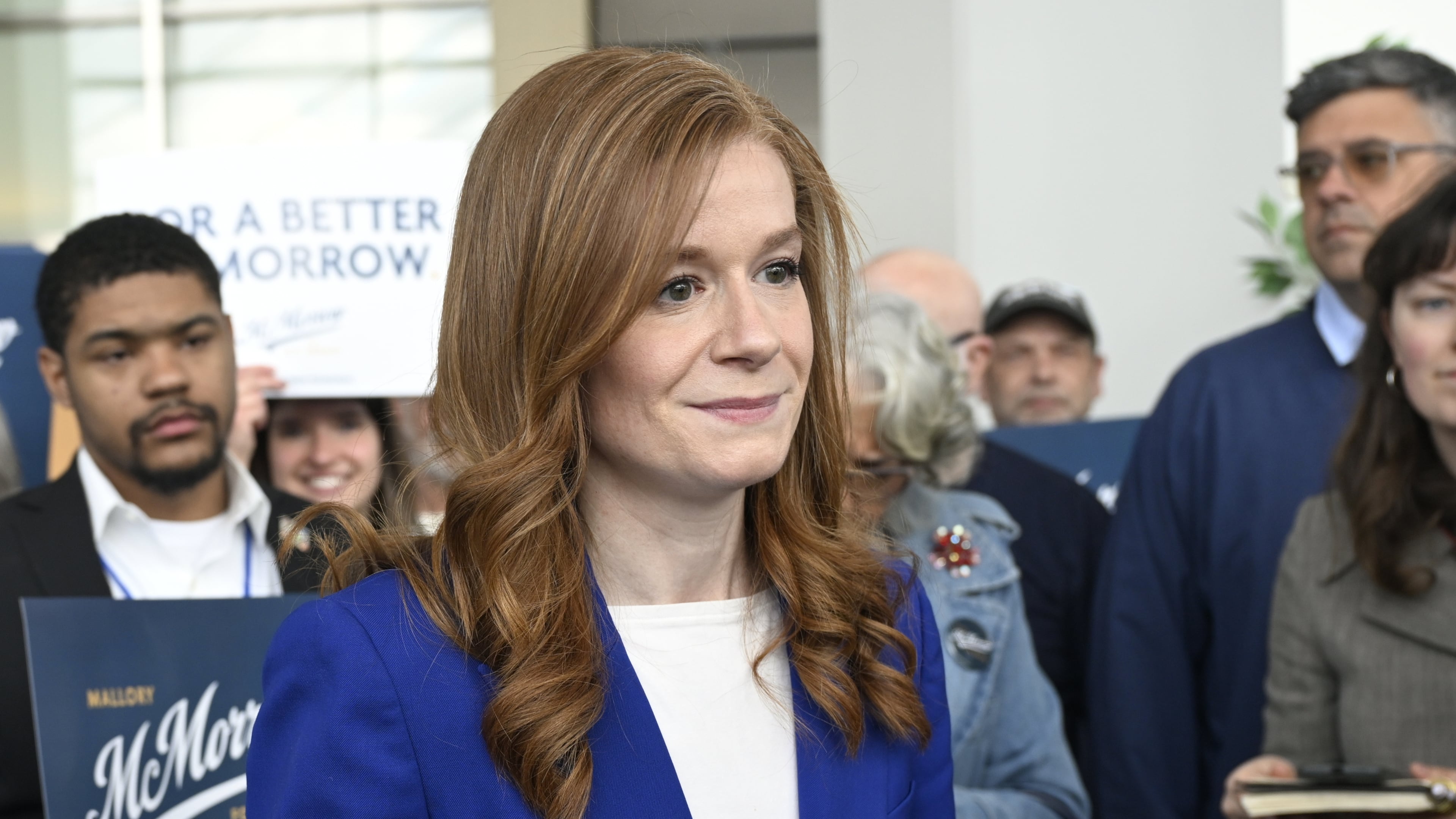 FILE - Michigan State Sen. Mallory McMorrow, D-Royal Oak, a candidate for the U.S. Senate, listens to questions from the media during the Michigan Democratic Party State Endorsement Convention, April 19, 2026, in Detroit. (AP Photo/Jose Juarez, File)