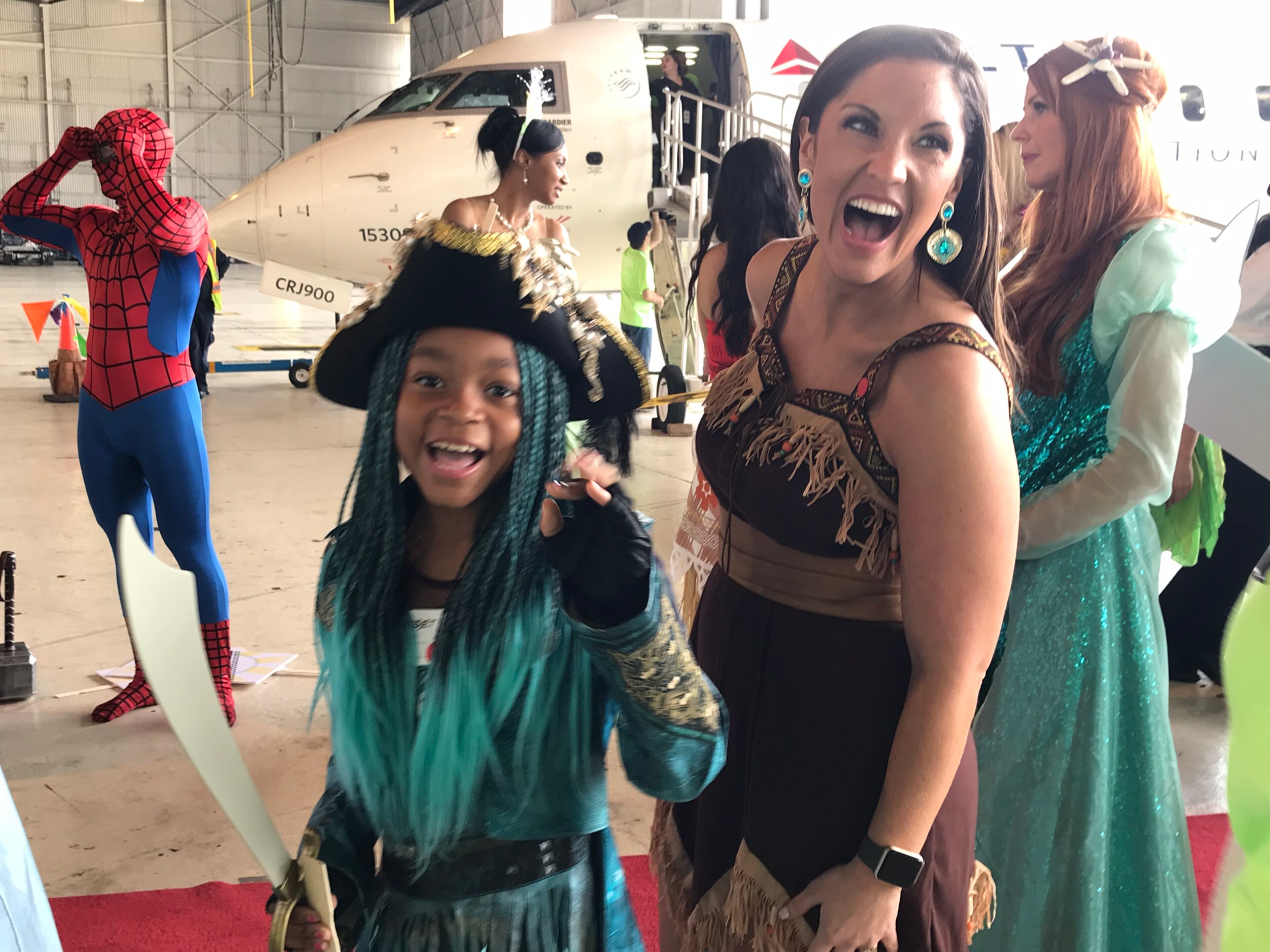 Alanna Milner (left) plays a "Descendants" character with "Pocahantos" Laura Alice Lopez. CREDIT: Rodney Ho/rho@ajc.com