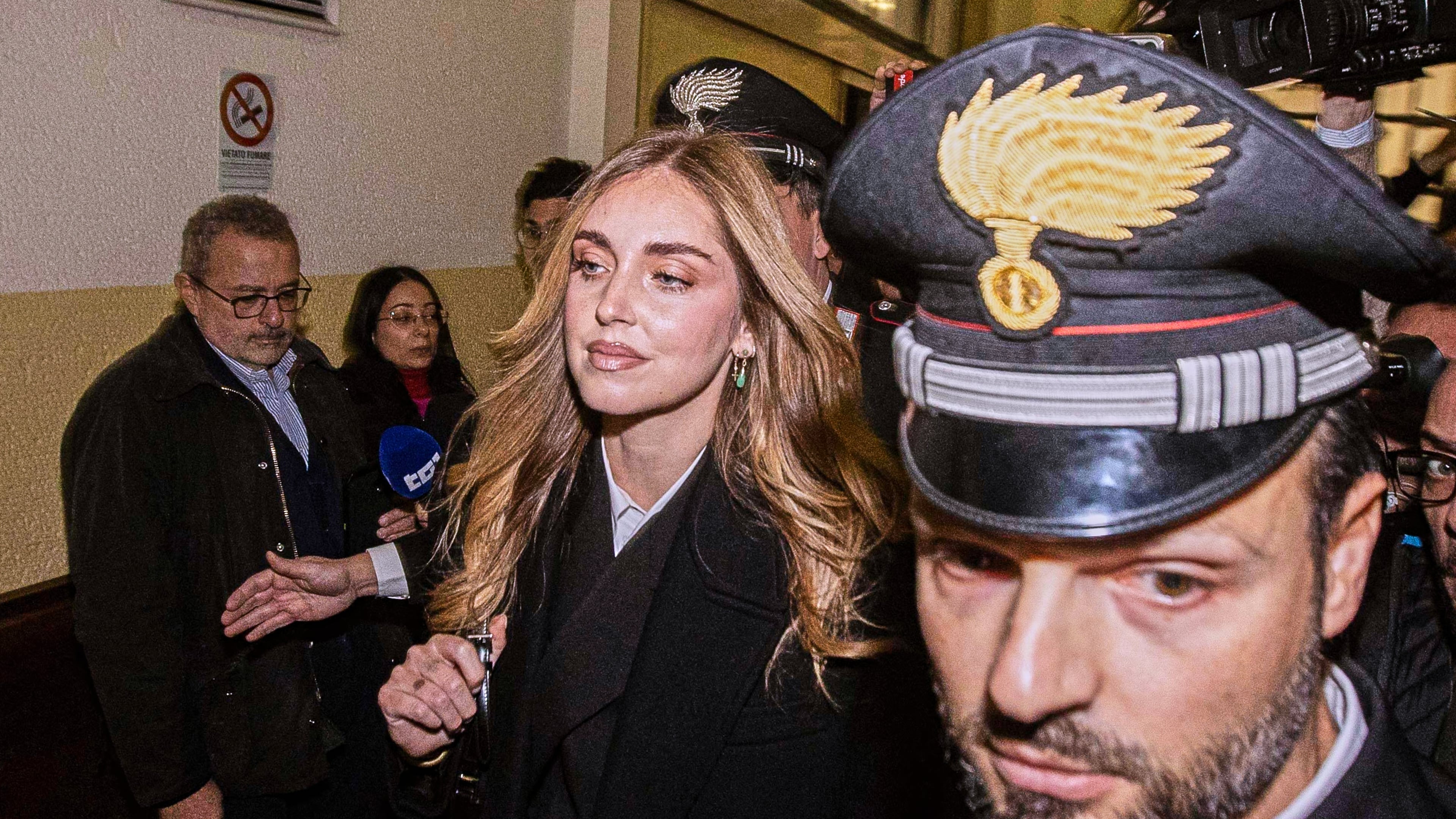 Influencer Chiara Ferragni arrives at the Milan Law Court on Wednesday, Jan. 14, 2026, where a first-instance verdict is expected in a trial in which she was indicted for promoting misleading advertising presented as charity. (Marco Ottico/LaPresse via AP)