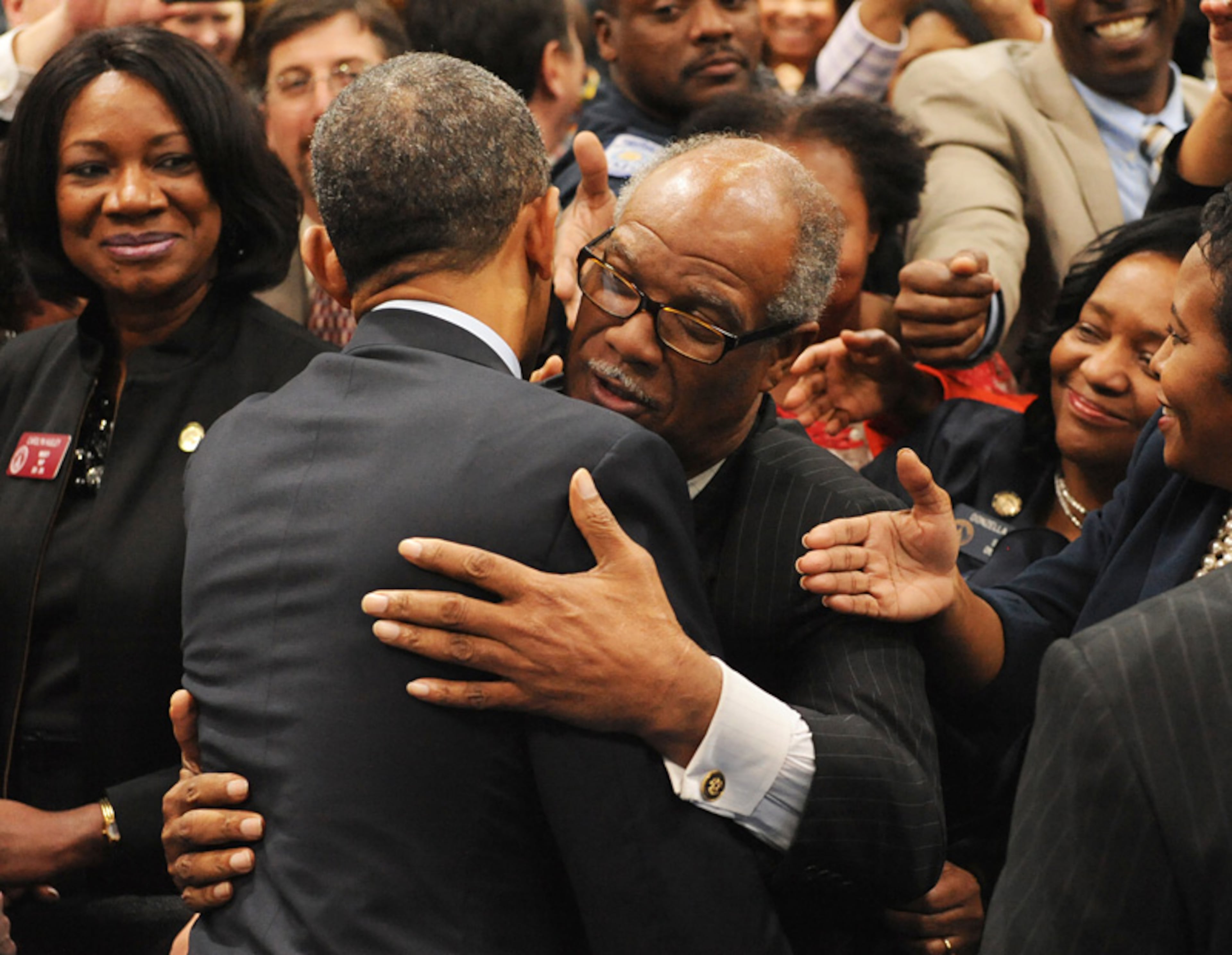 President Barack Obama gets a hug from Calvin Smyre, Democratic member of the Georgia House of Representatives.