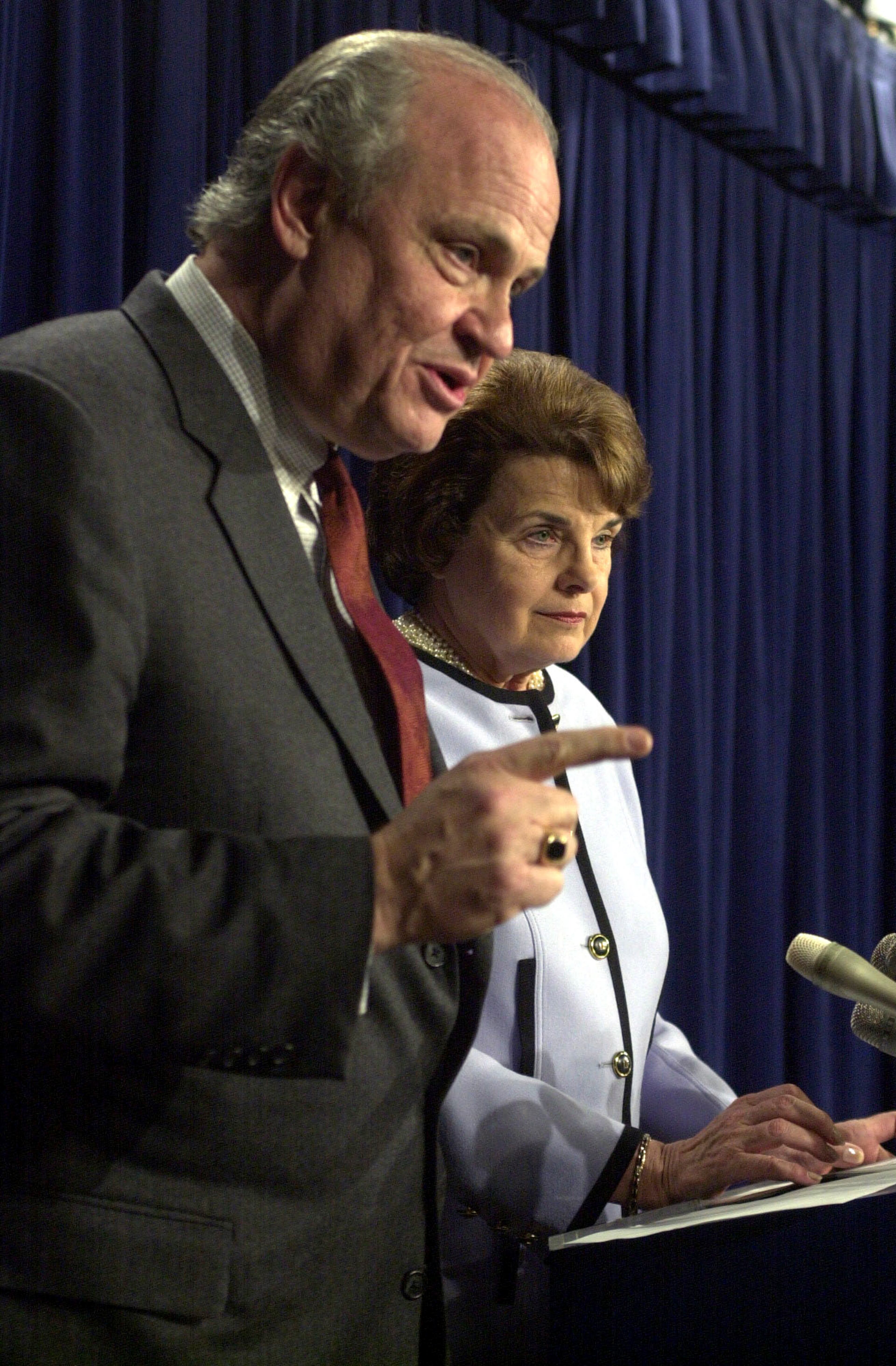 UNITED STATES - MARCH 28: Sens. Fred Thompson, R-TN, and Dianne Feinstein, D-CA, talk about the Campaign Finance agreement in the Senate Studio, Wednesday afternoon. (Photo By Tom Williams/Roll Call/Getty Images)