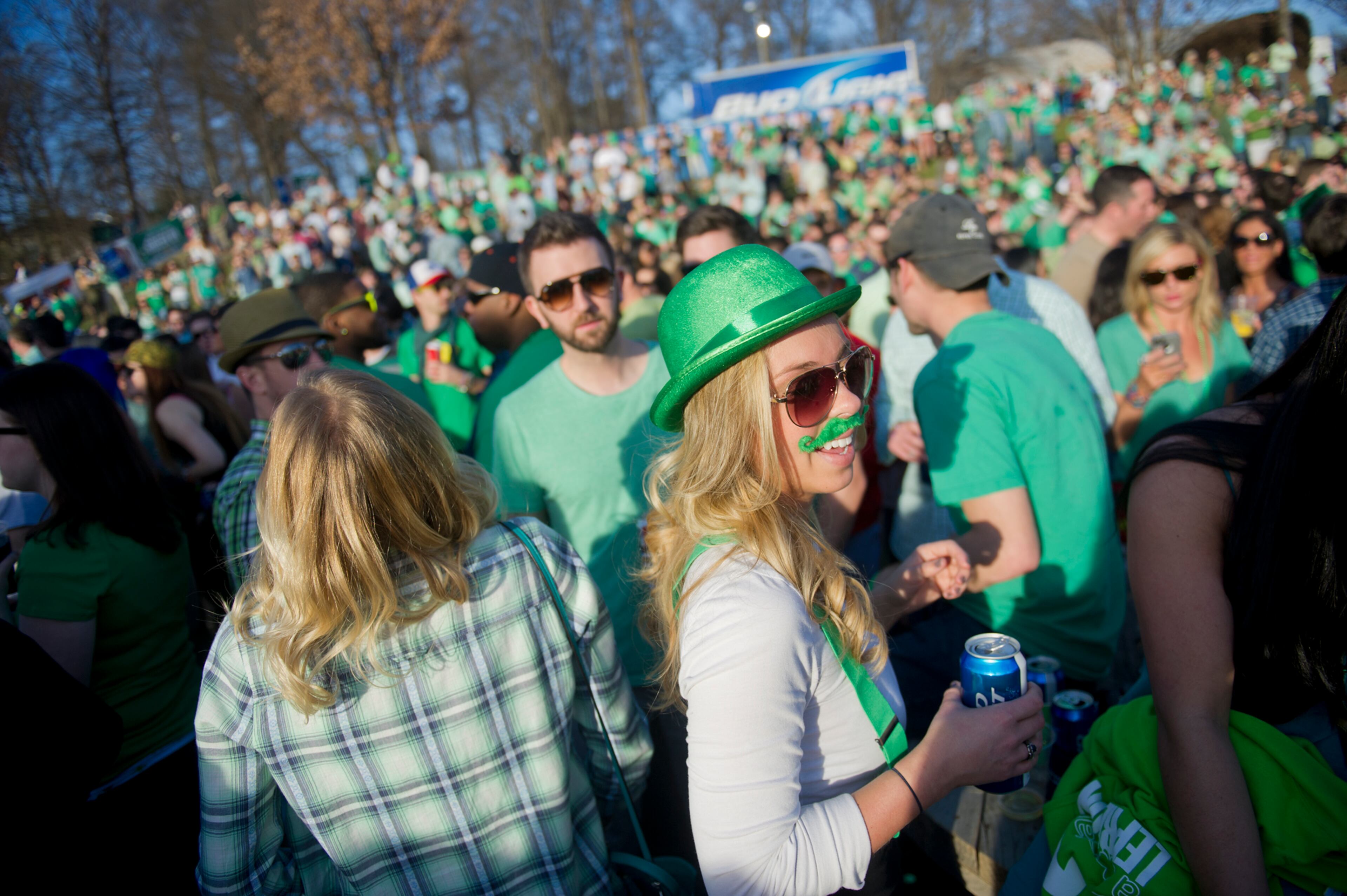 Sarah Drury (right) drinks with friends during the 4th annual Lepre*CON at Park Tavern in Atlanta on Saturday, March 8, 2014. Hundreds of people came to the pub at Piedmont Park to celebrate St. Patrick's Day.