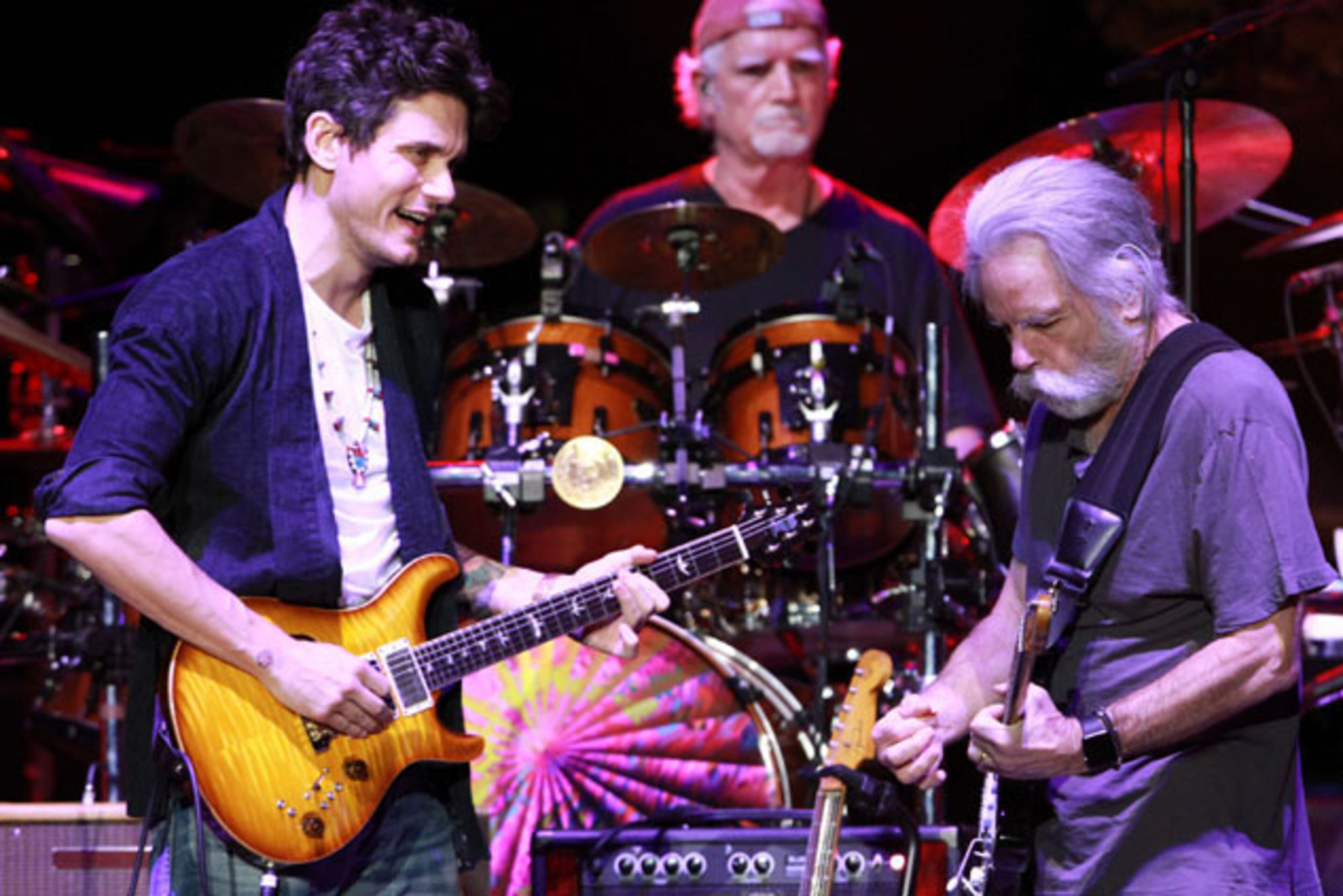 John Mayer and Bob Weir jam out on "Feel Like a Stranger" during Dead & Company's performance Tuesday, Nov. 17, 2015 at Philips Arena in Atlanta. Dead & Company consists of former Grateful Dead members Bob Weir (vocals, guitar), Mickey Hart (drums), and Bill Kreutzmann (drums), along with John Mayer (guitar, vocals), Oteil Burbridge (bass), and Jeff Chimenti (keyboards). Robb D. Cohen /RobbsPhotos.com