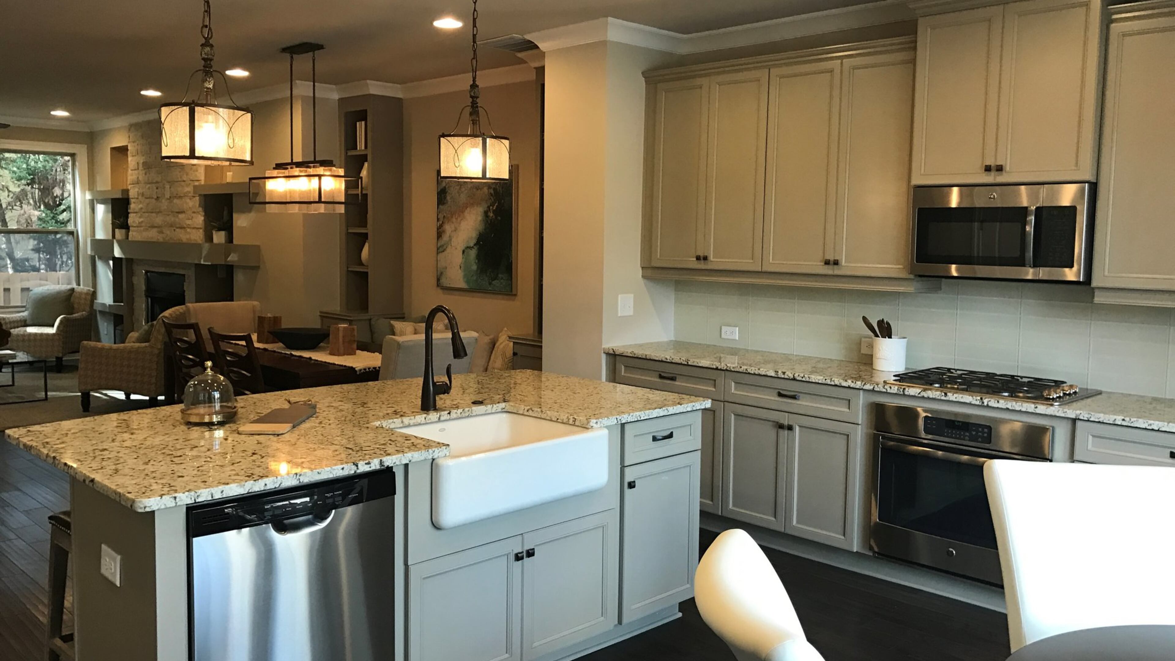 Fitting a farmhouse sink into a kitchen design involves cutting away the front cabinetry. CONTRIBUTED BY The Providence Group