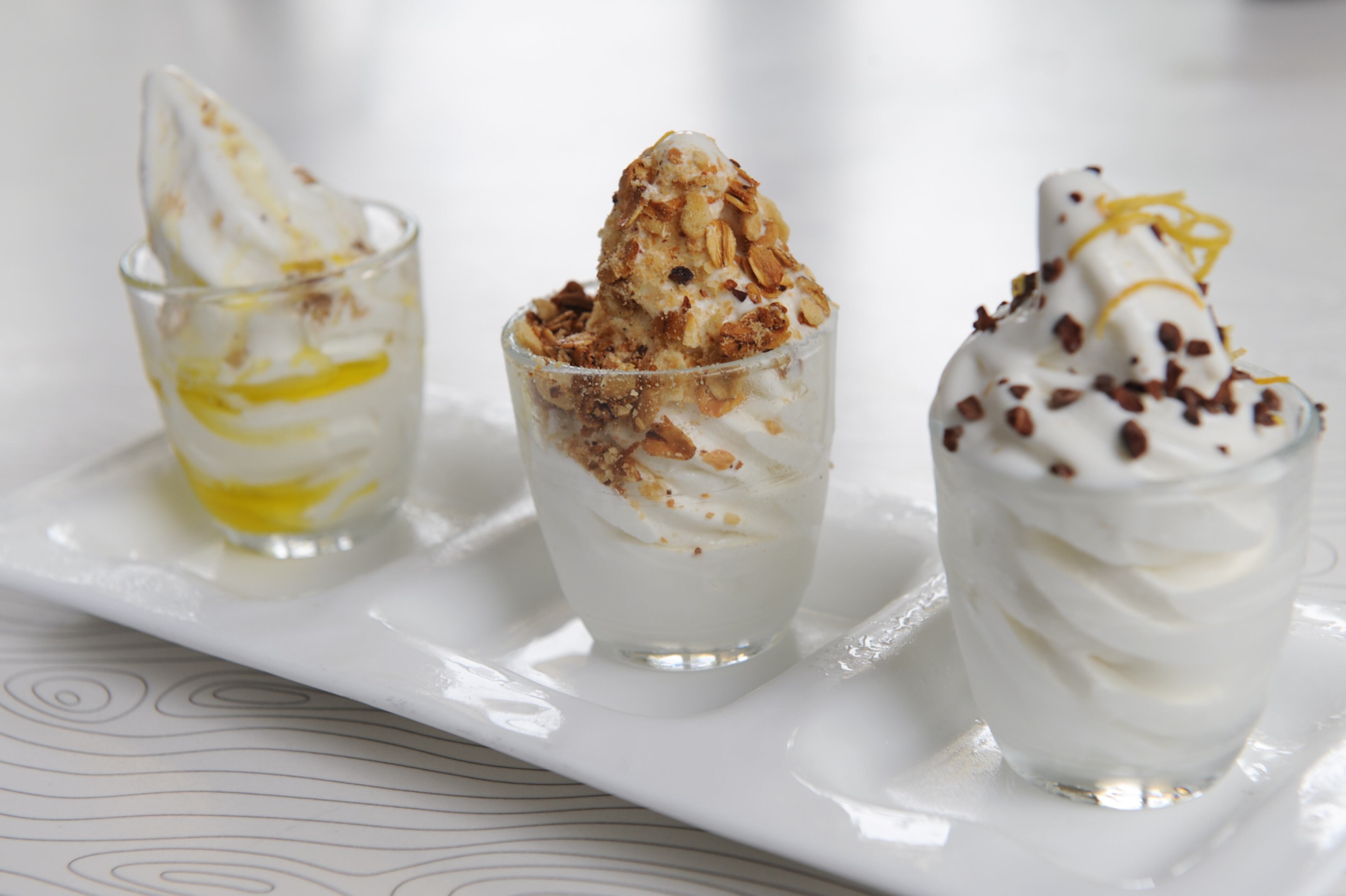 "I can never leave without a bite of this soft-serve ice milk topped with (left to right) granola, cocoa nibs and candied lemon zest, and olive oil with sea salt. The richness is all in the mouth, not in the way it feels in your stomach."