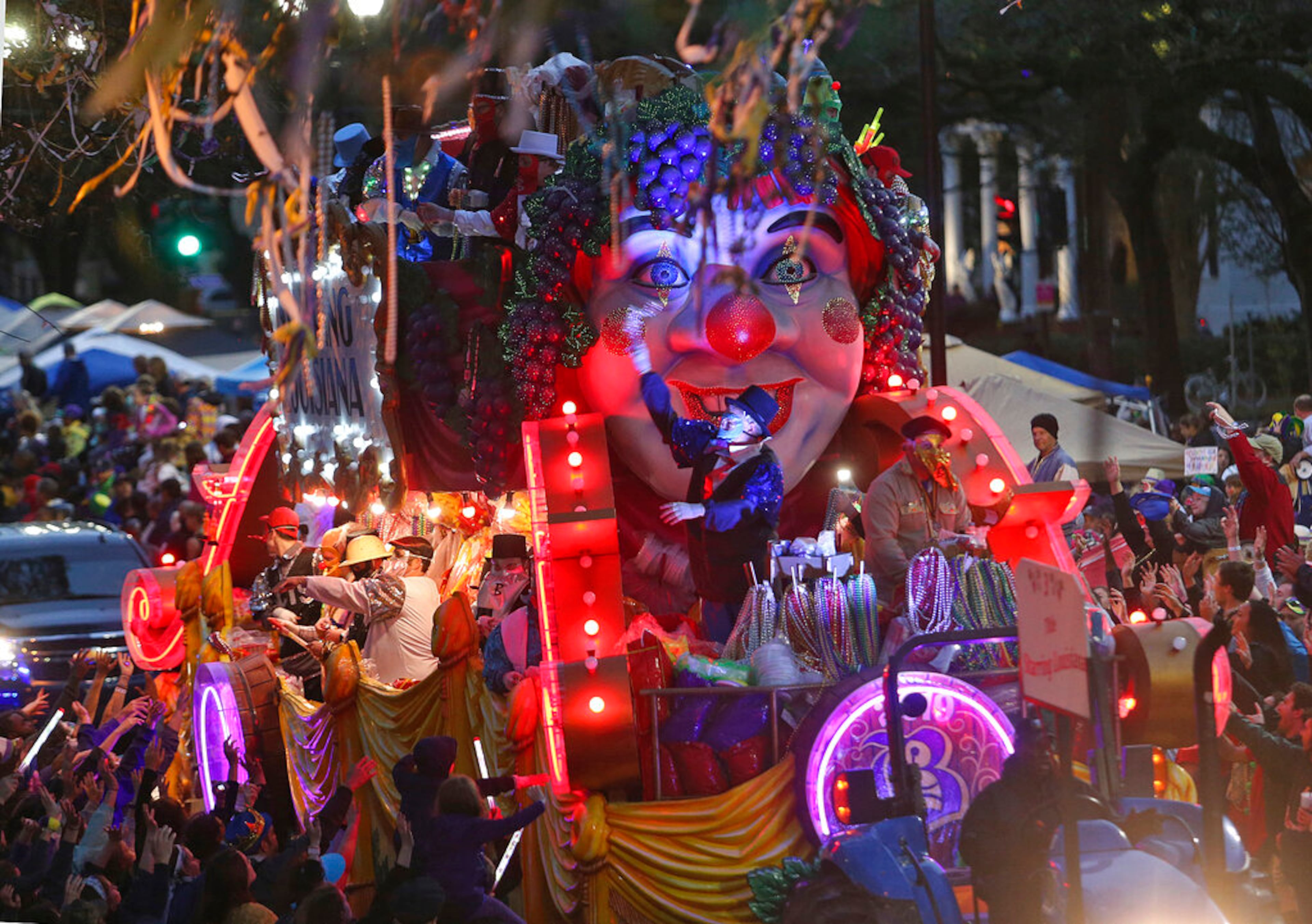 The Title Float rolls down Napoleon Avenue as the 1,600 men of Bacchus present their 32-float Mardi Gras parade entitled "Starring Louisiana" on the Uptown route in New Orleans on Sunday, March 3, 2019. (Michael DeMocker/The Times-Picayune via AP)