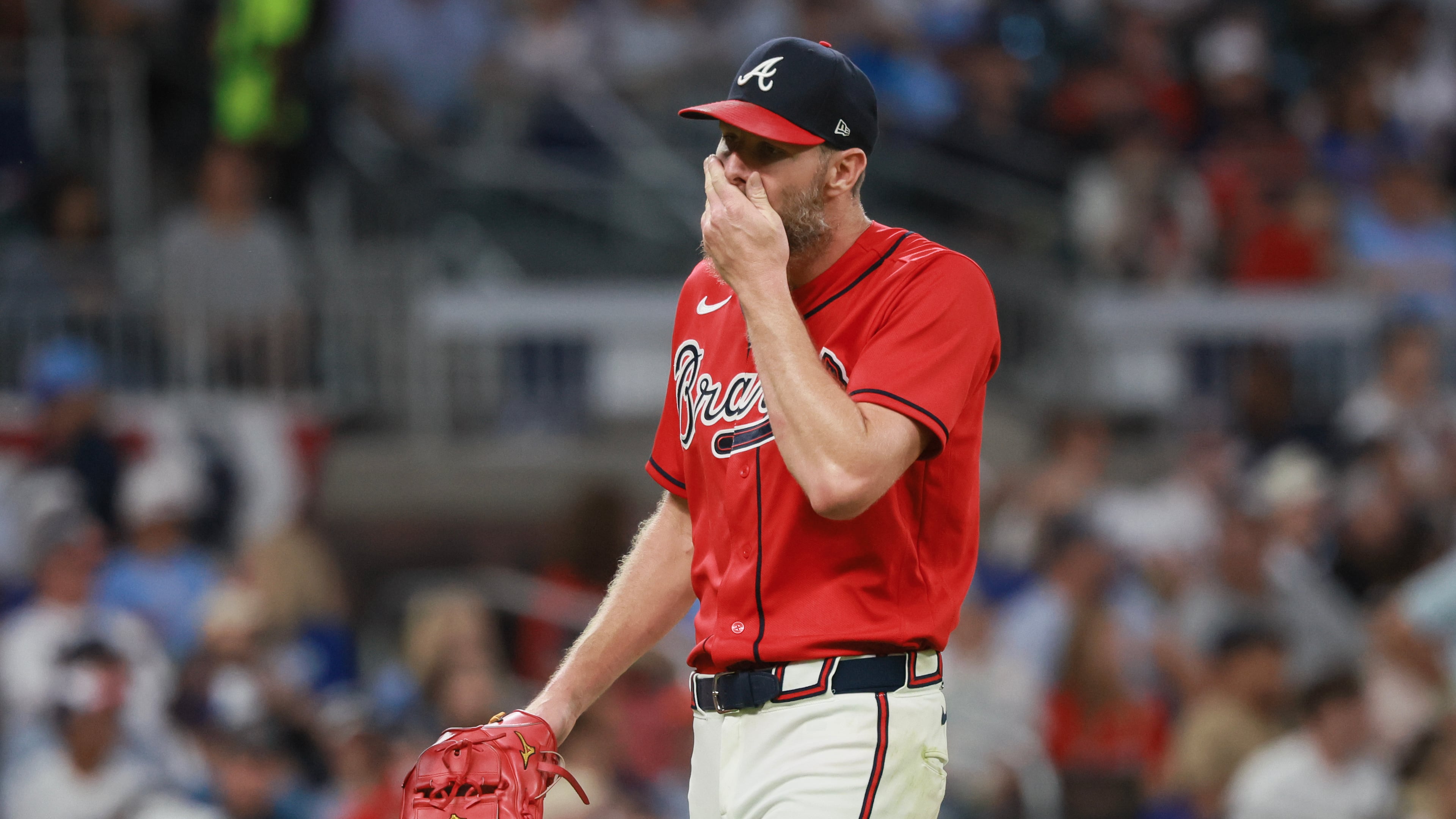 Braves pitcher Chris Sale walks to the dugout after giving up two home runs to the Dodgers during Game 3 of their National League Division Series on Tuesday, Oct. 6, 2026, in Atlanta. (Jason Getz/AJC)