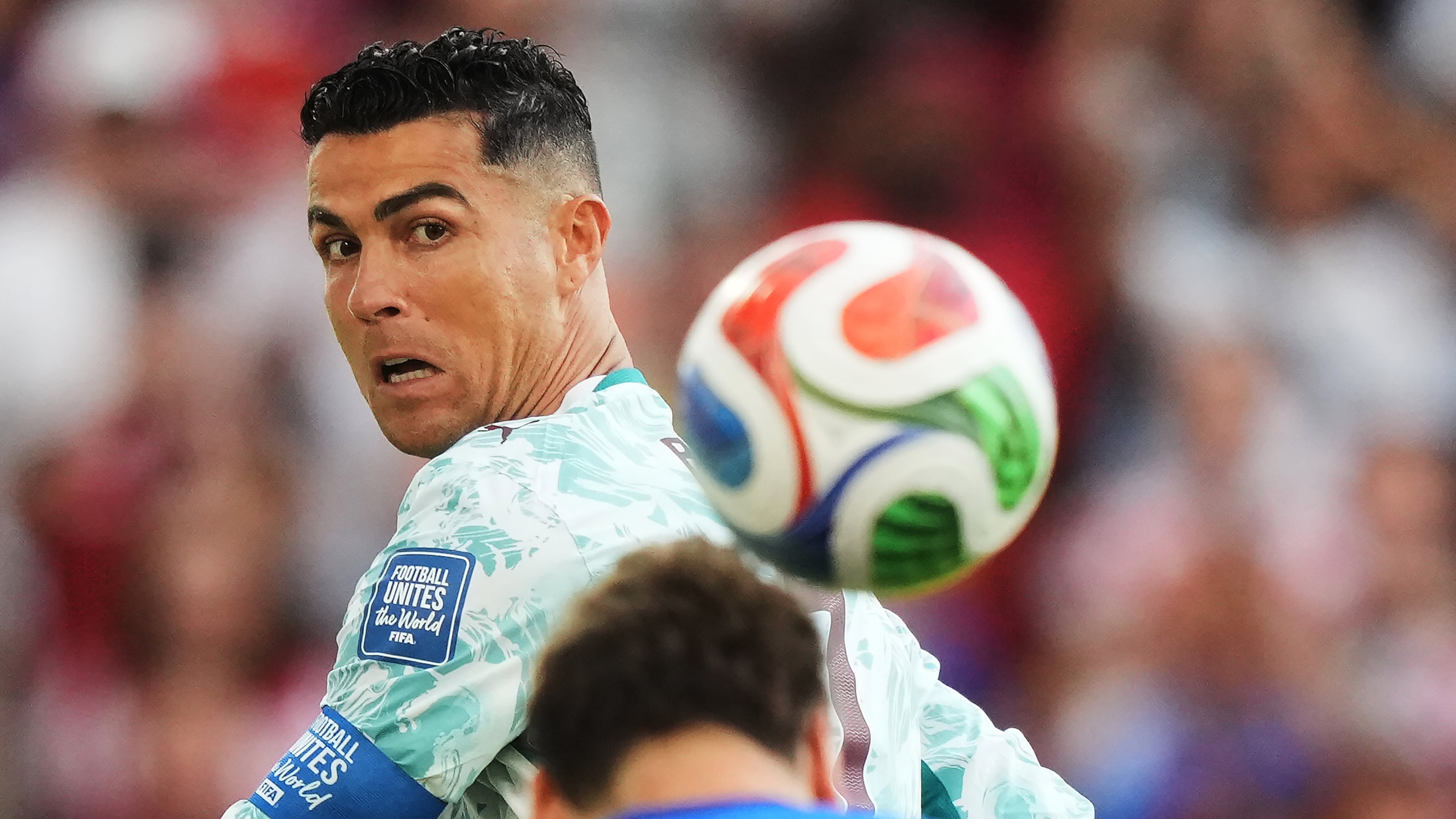 Portugal's Cristiano Ronaldo (7) watches as Croatia's Nikola Vlasic (13) heads the ball during the World Cup round of 32 soccer match between Portugal and Croatia in Toronto, Thursday, July 2, 2026. (Nathan Denette/The Canadian Press via AP)