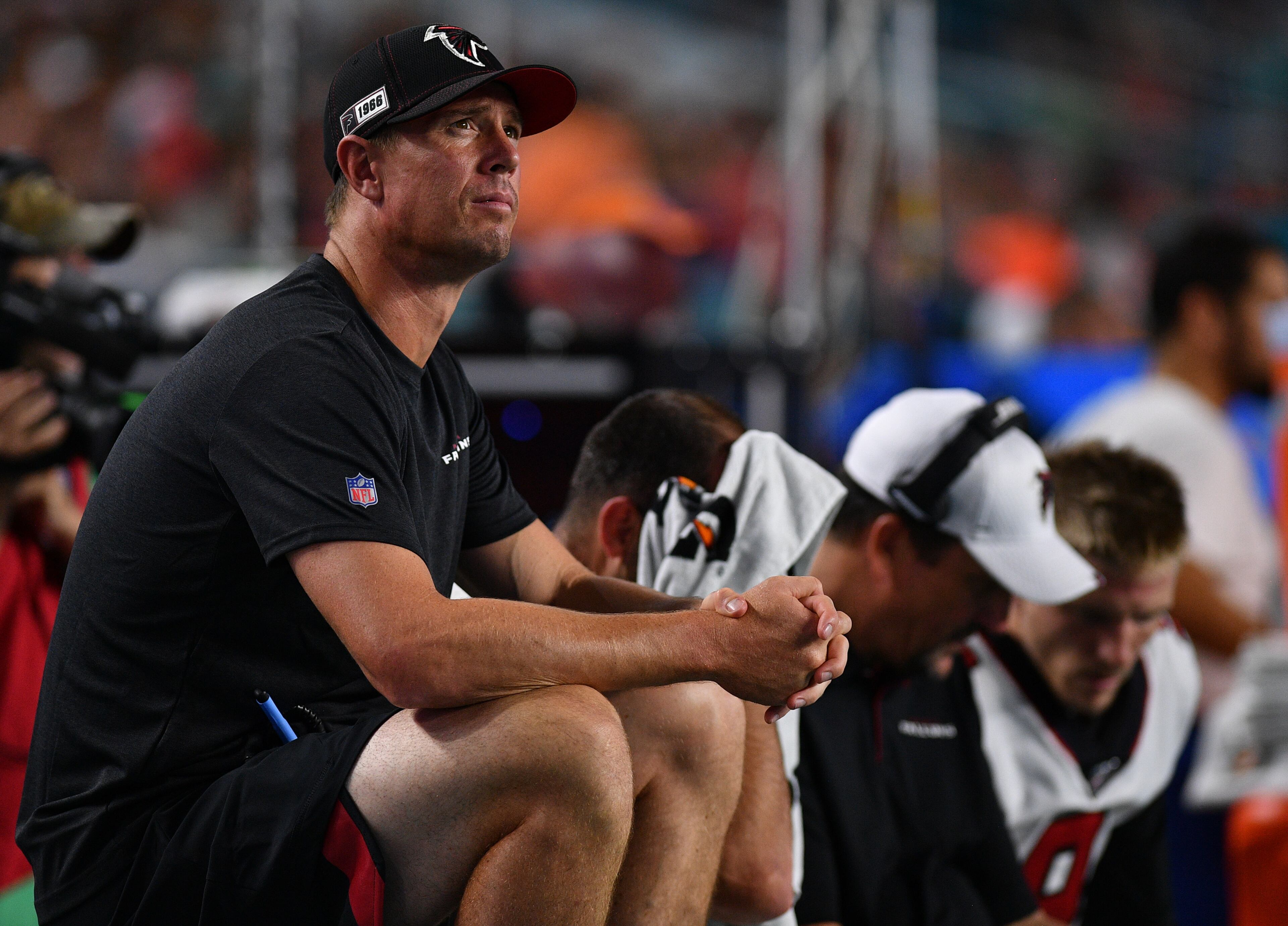 Matt Ryan #2 of the Atlanta Falcons on the bench in the first quarter during a preseason game against the Miami Dolphins at Hard Rock Stadium on August 8, 2019 in Miami, Florida. (Photo by Mark Brown/Getty Images)