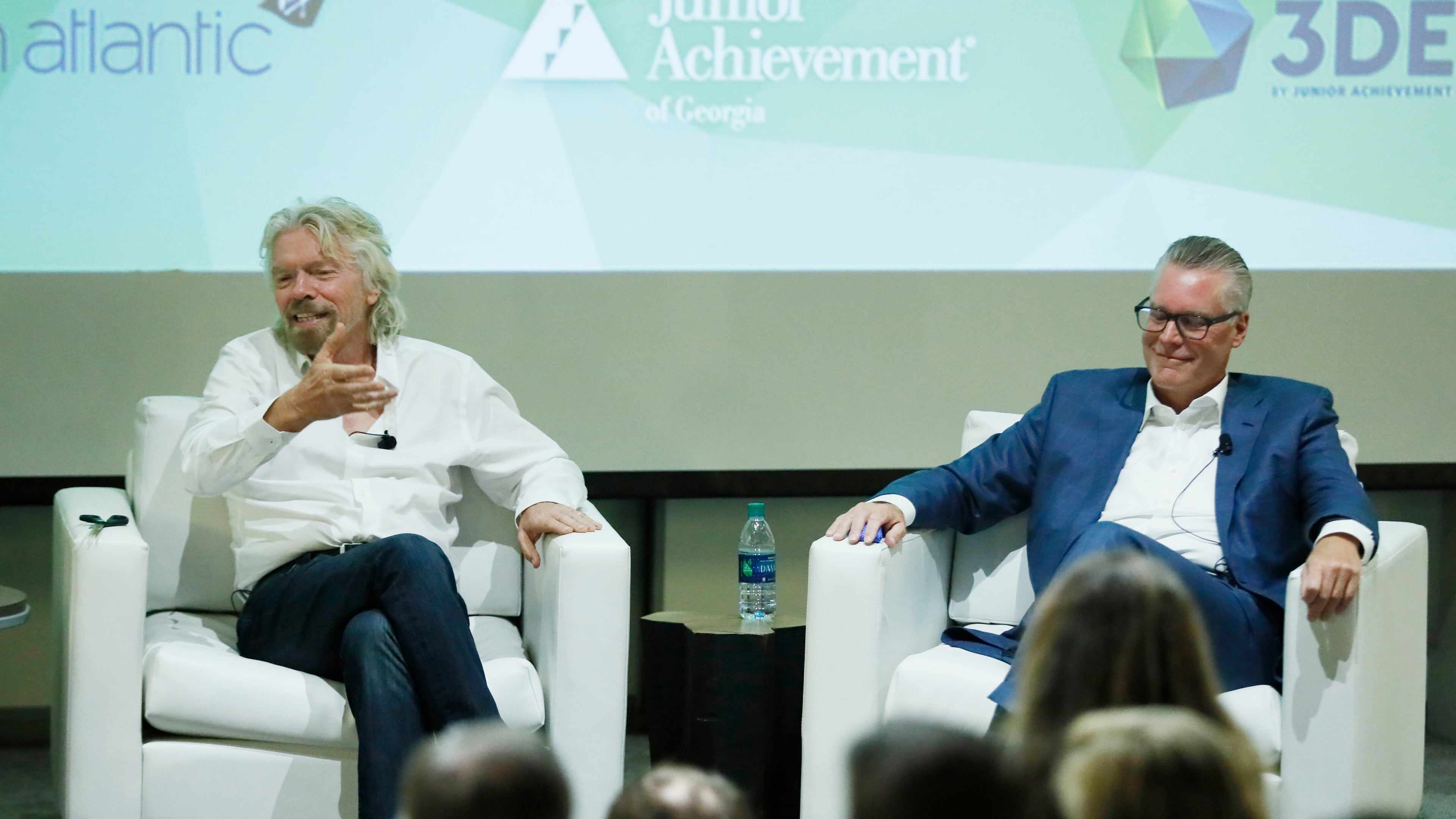 Delta CEO Ed Bastian and Virgin founder Richard Branson held a "fireside chat" event in Atlanta. BOB ANDRES /BANDRES@AJC.COM
