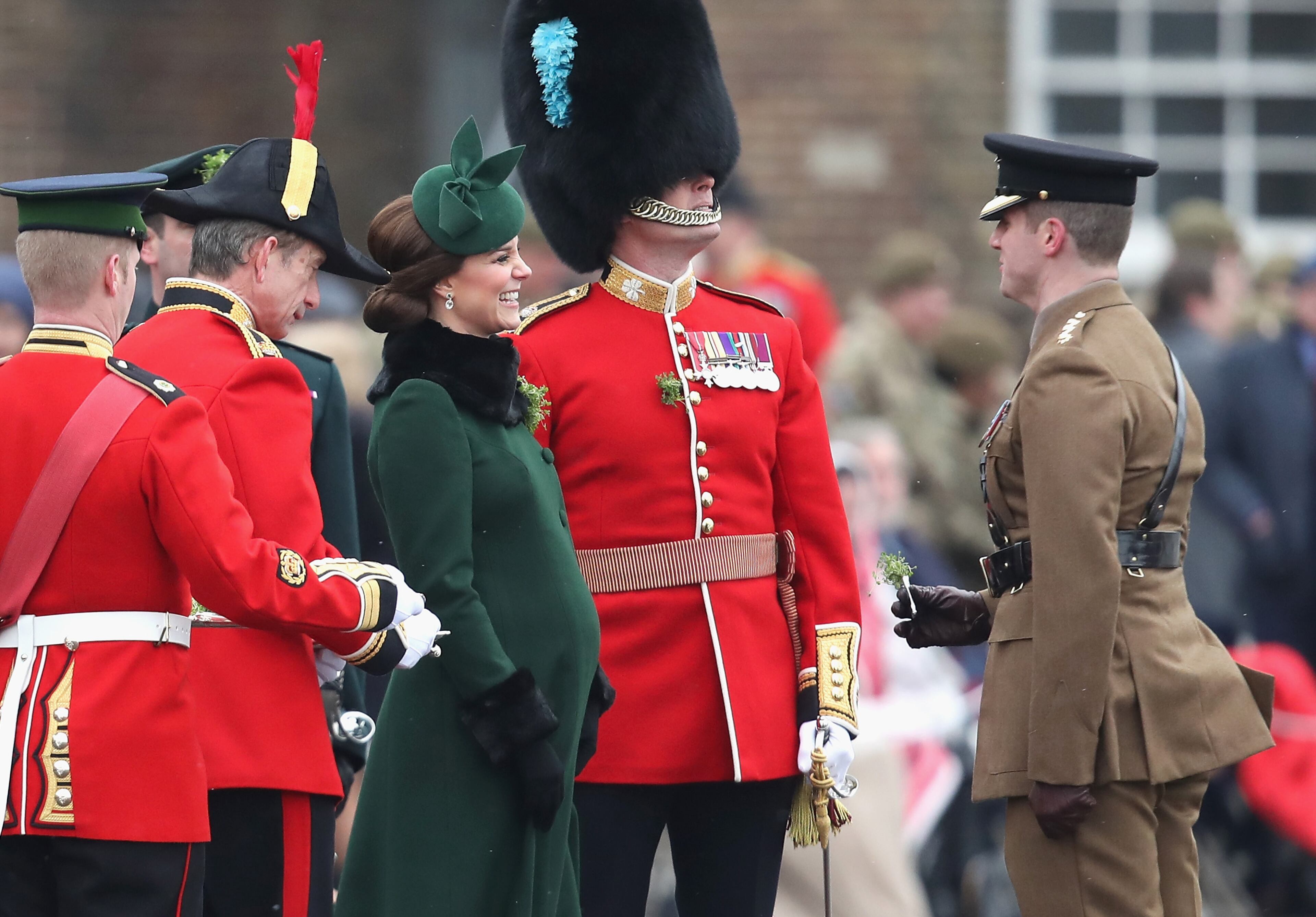 HOUNSLOW, ENGLAND - MARCH 17: Catherine, Duchess of Cambridge presents the 1st Battalion Irish Guardsmen with shamrocks during the annual Irish Guards St Patrick's Day Parade at Cavalry Barracks on March 17, 2018 in Hounslow, England. (Photo by Chris Jackson/Getty Images)