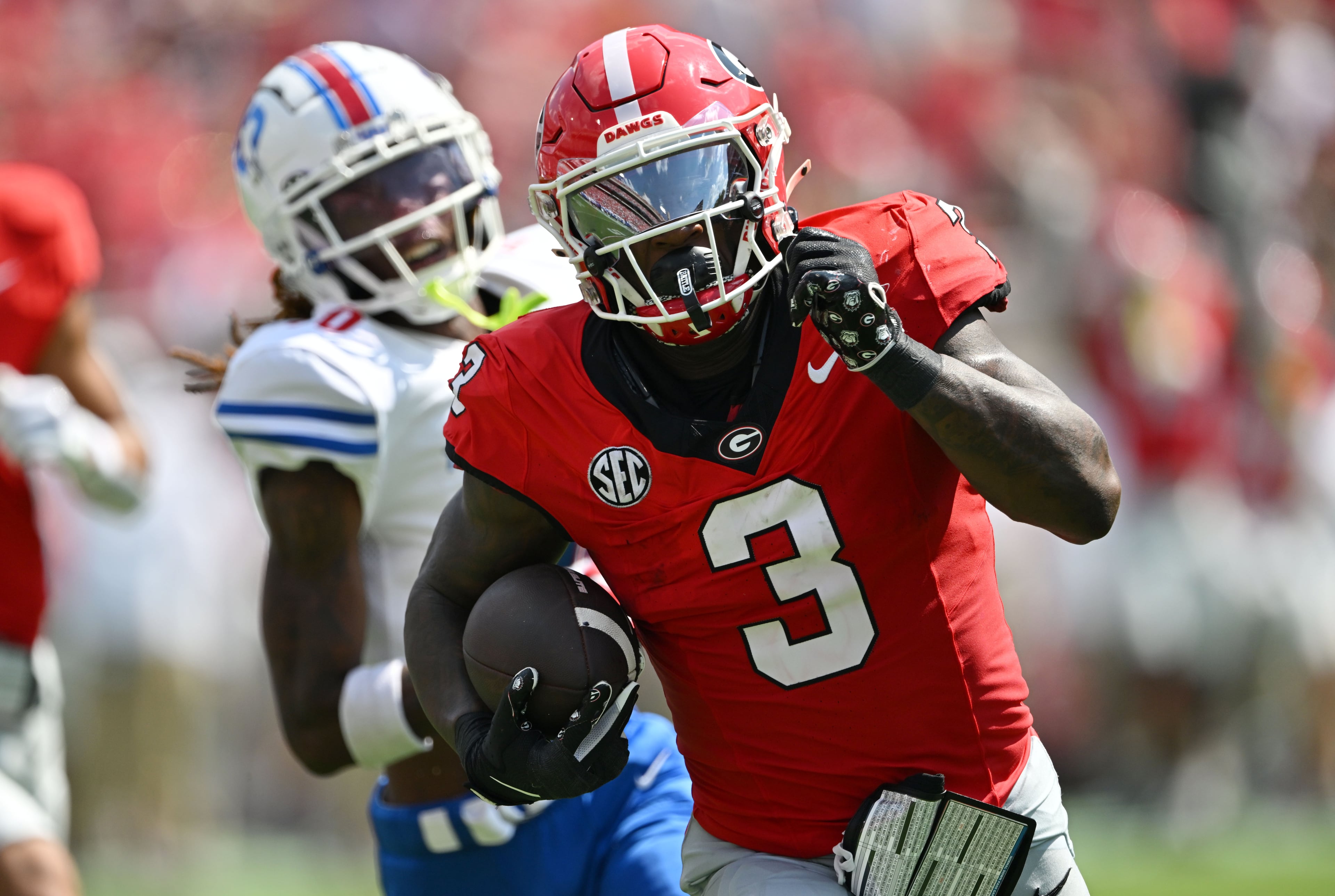 Georgia running back Nate Frazier runs for a touchdown during the first half in an NCAA football game vs. Tennessee State at Sanford Stadium on Saturday, Sept. 5, 2026, in Athens, Ga. (Hyosub Shin/AJC)