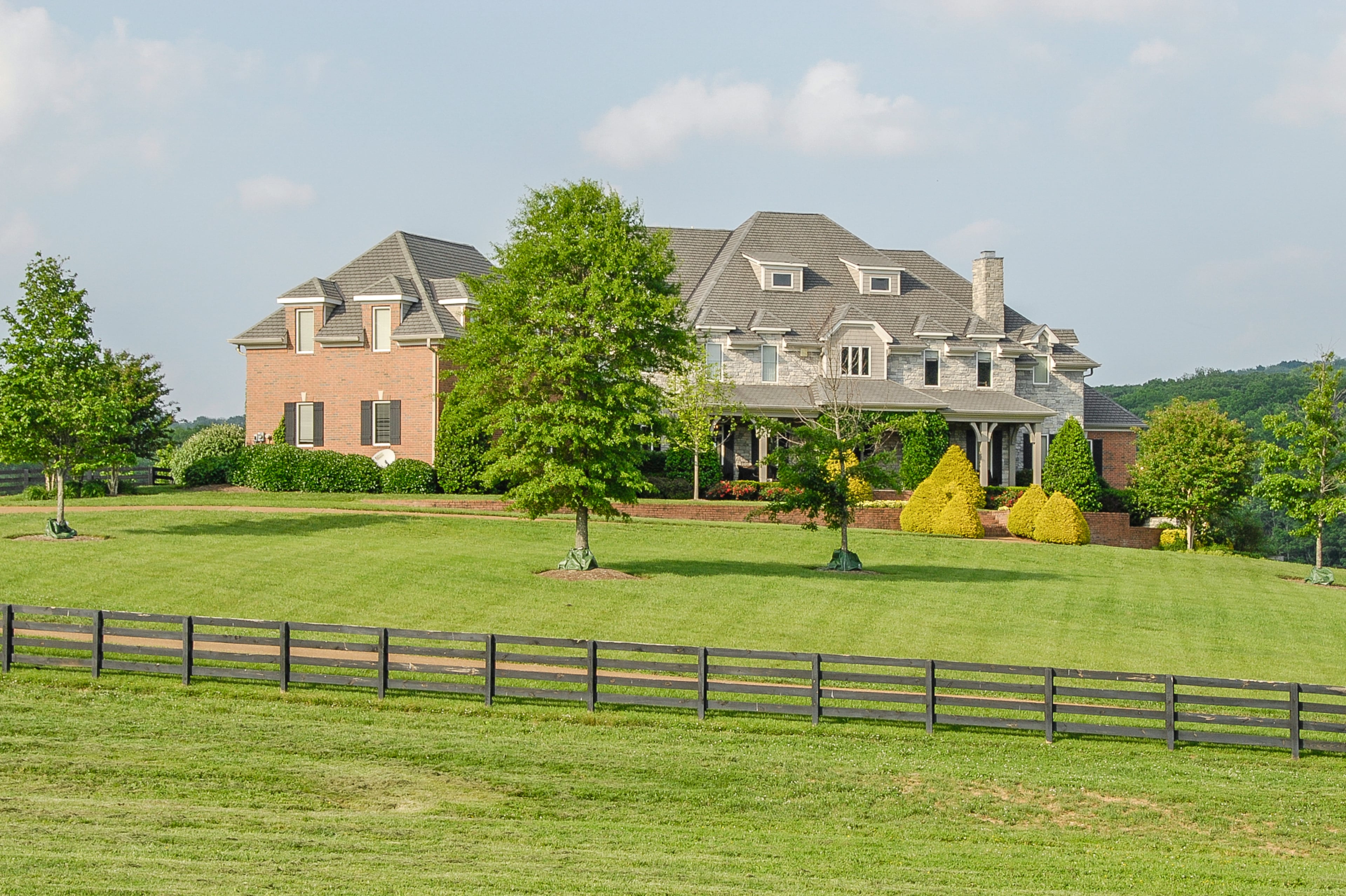 Singer-songwriter Sheryl Crow has owned her solar-powered Cross Creek Farm, now listed for $5.8 million, since 2006. The 152-acre property near Nashville, Tenn., includes the 10,264-square-foot main house, a 14-stall barn, a storage building and guest/staff houses, a pool with a waterfall and spa, a Western-style saloon, and indoor and outdoor riding areas. For more information, visit http://www.toptenrealestatedeals.com/homes/weekly-ten-best-home-deals/2013/7-30-2013/.